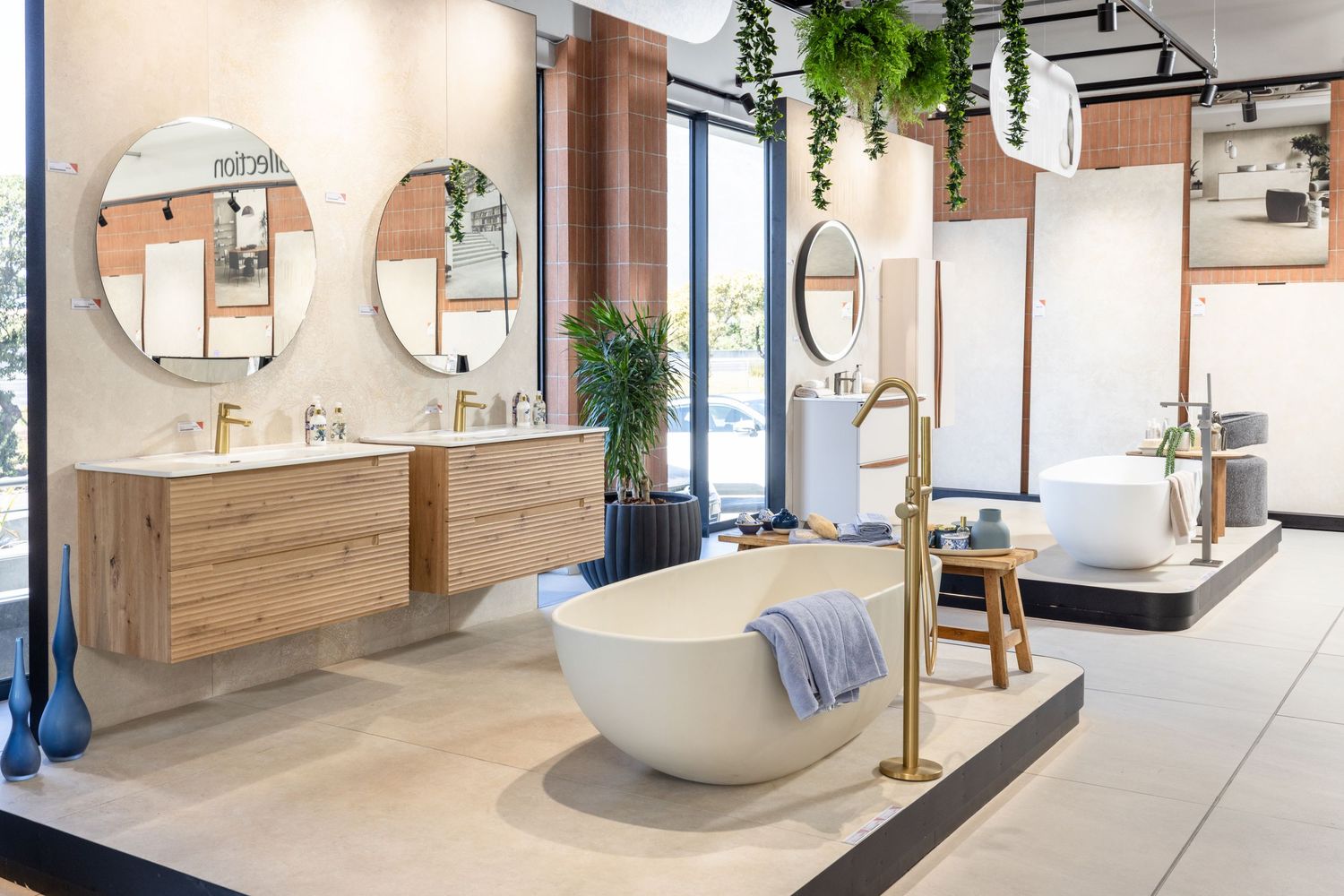 Minimalist office interior with curved wooden elements, white walls, and natural lighting creating an airy workspace.