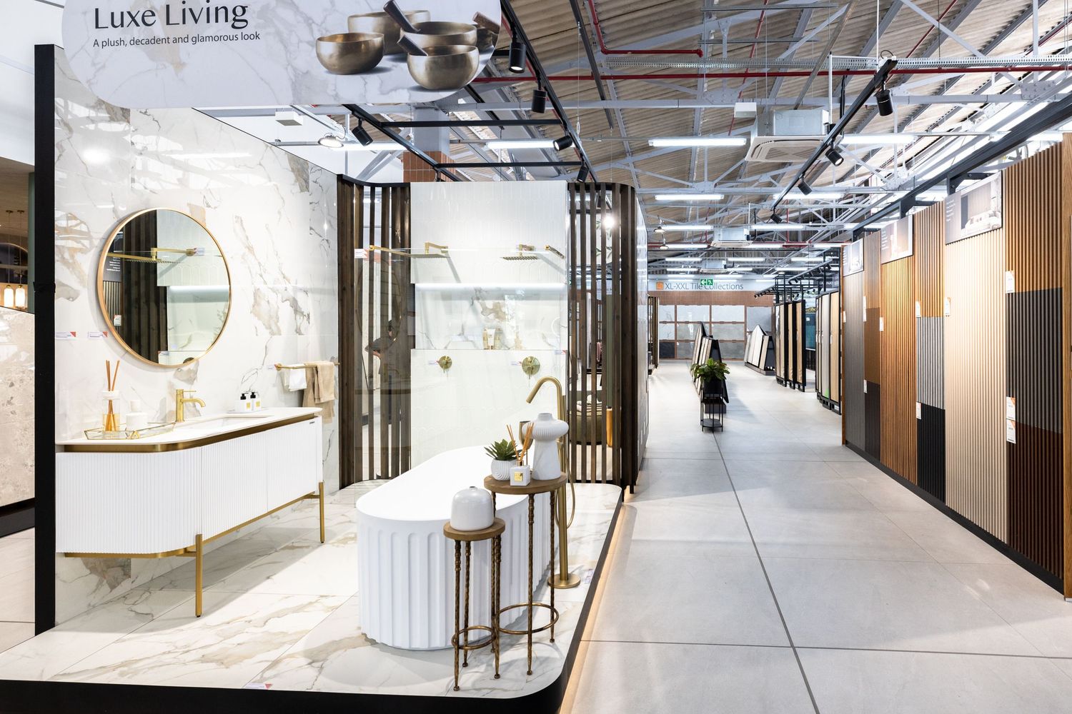 Contemporary office corridor with exposed ceiling, modern lighting and clean architectural lines.
