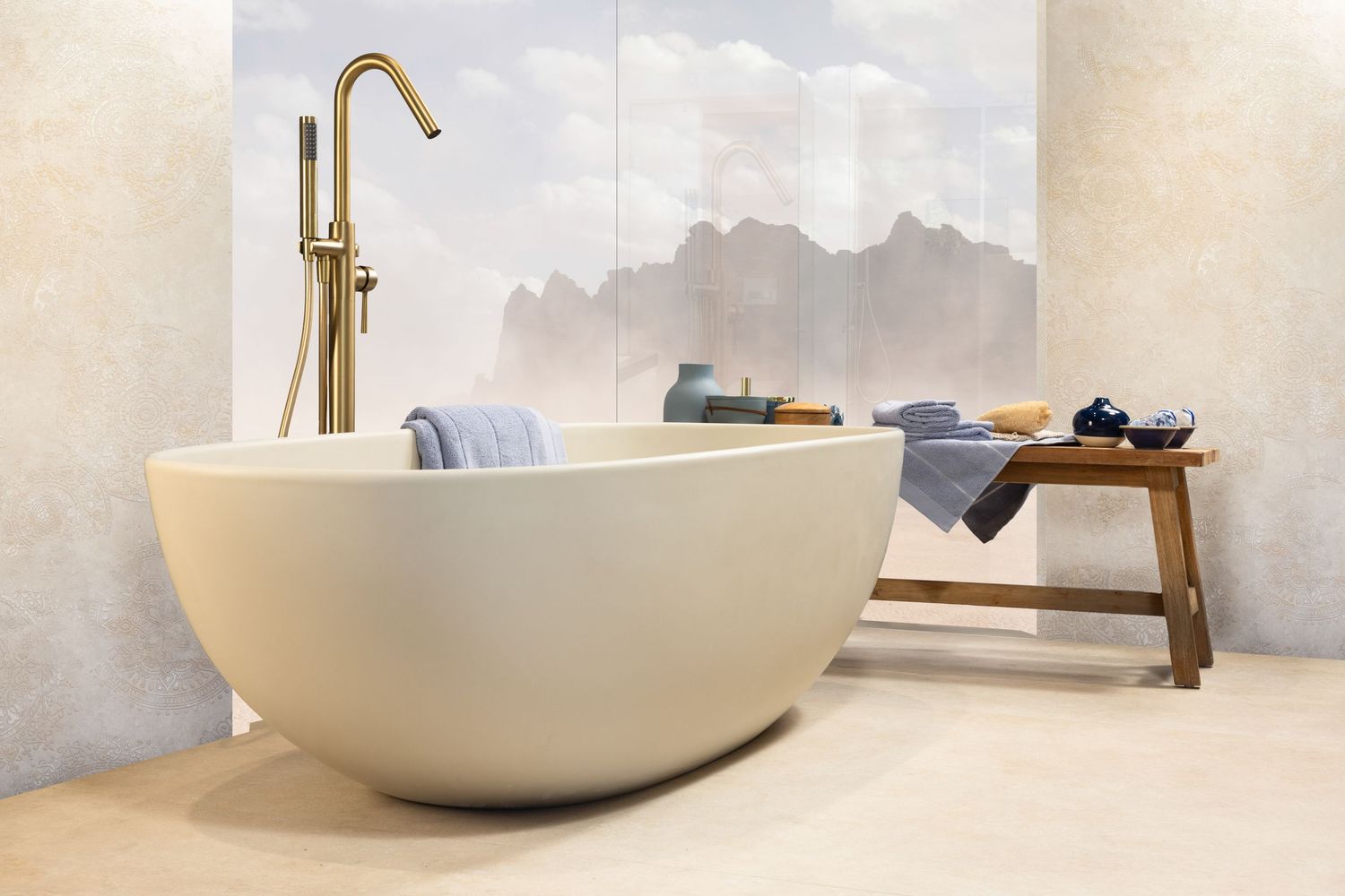 Modern bathroom interior with freestanding white bathtub and wooden accents against a light neutral backdrop.