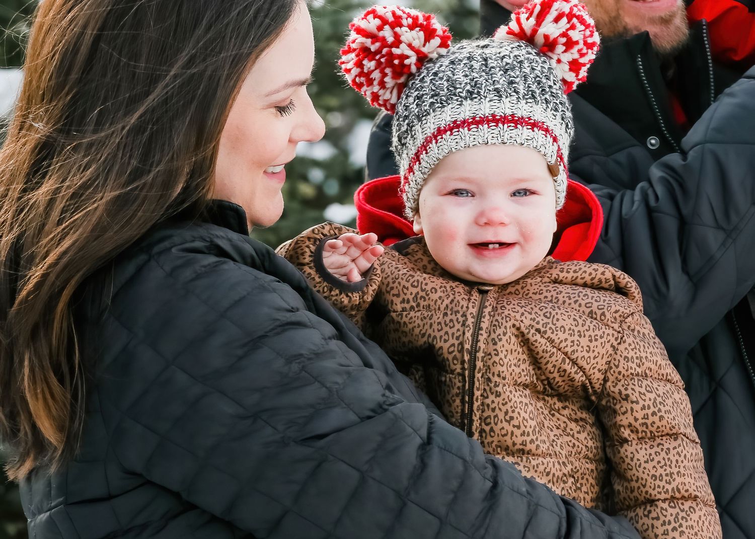 A series of candid winter moments showing people wearing cozy winter clothing and sharing warm smiles.