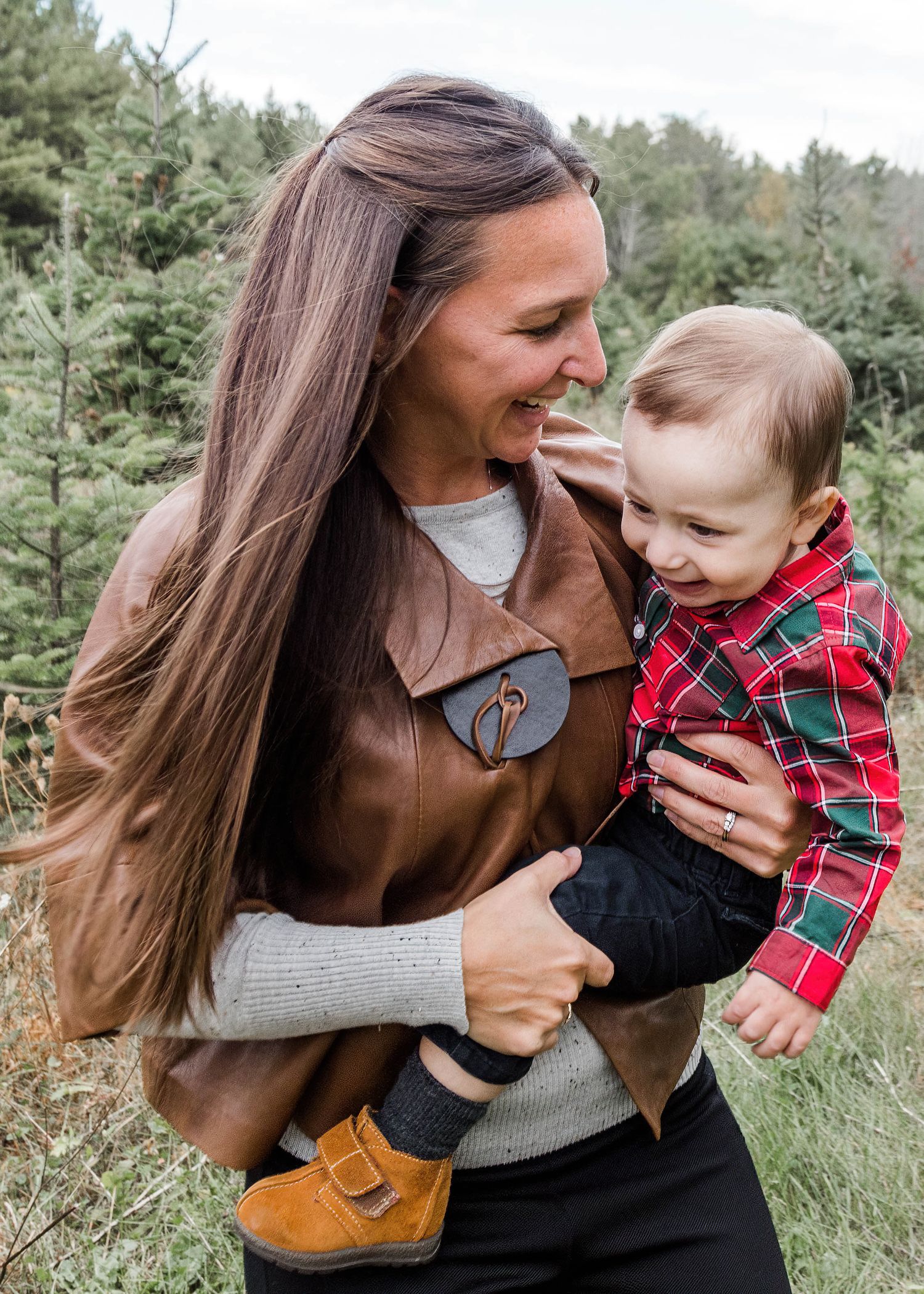 Playful outdoor family moments captured in a series of joyful photographs.