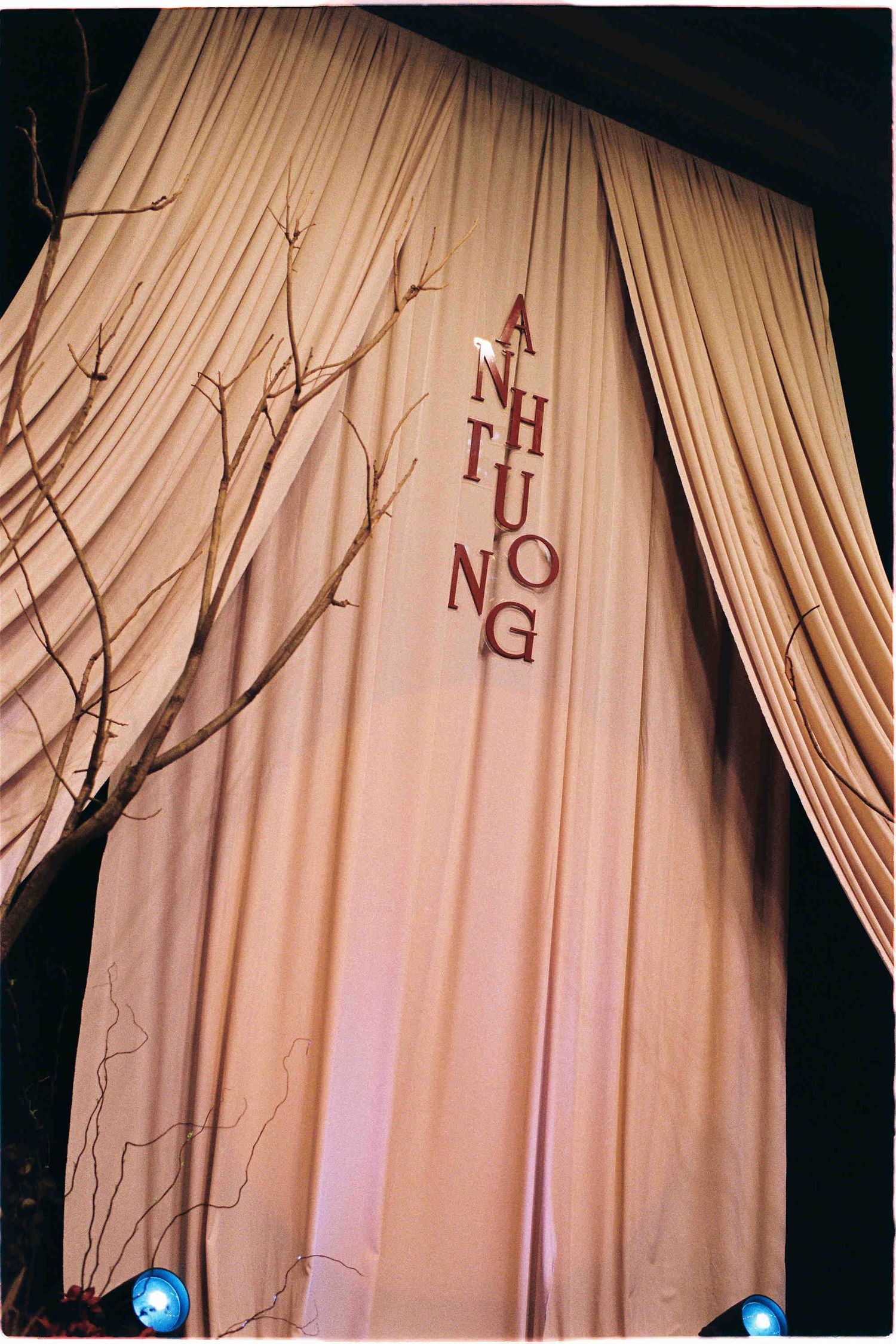 Elegant draped cream curtain backdrop with 