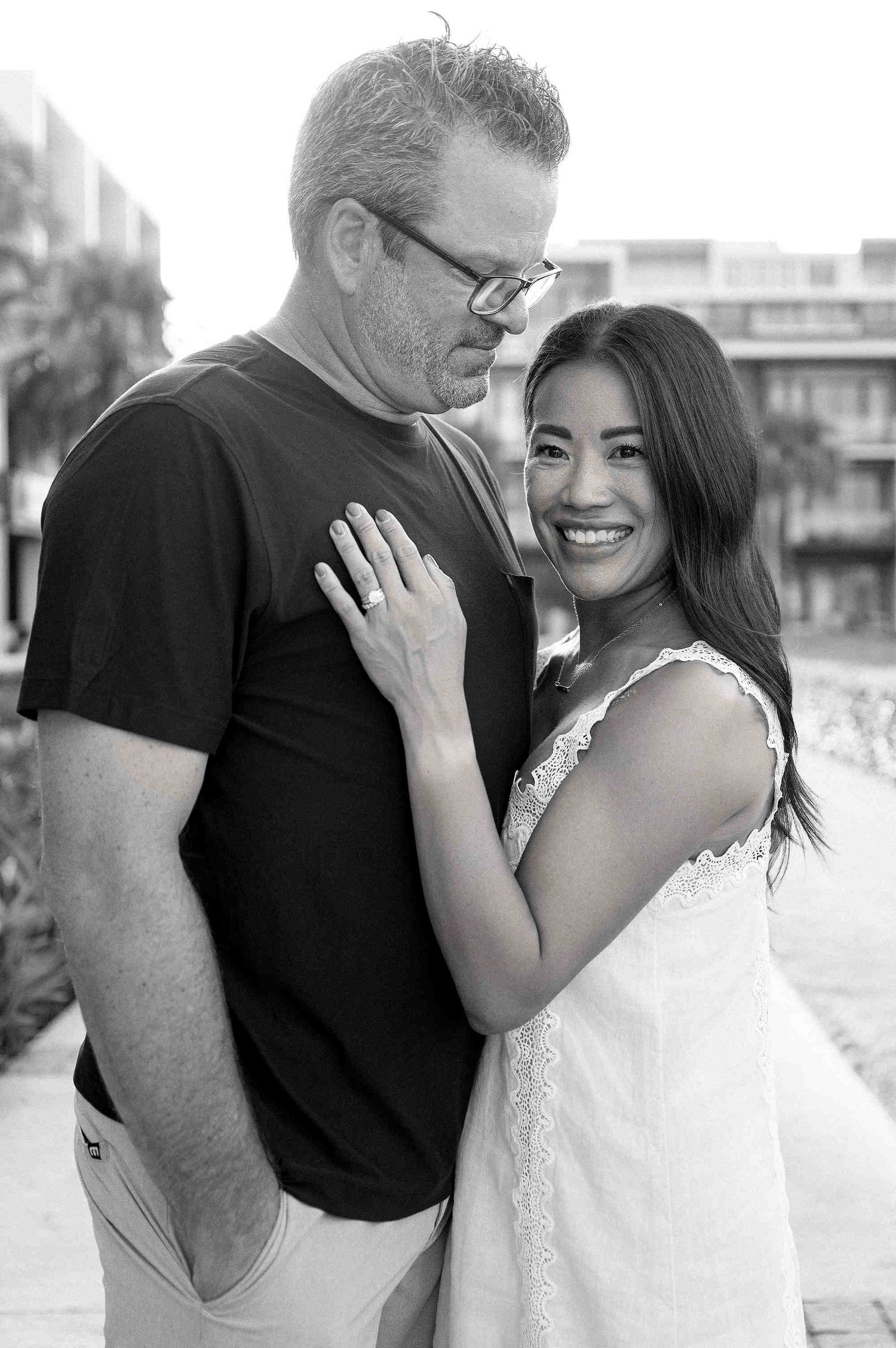Da Nang family: romantic couple shares intimate moments in a series of black and white photos by the waterfront, by AnhVuWedding.