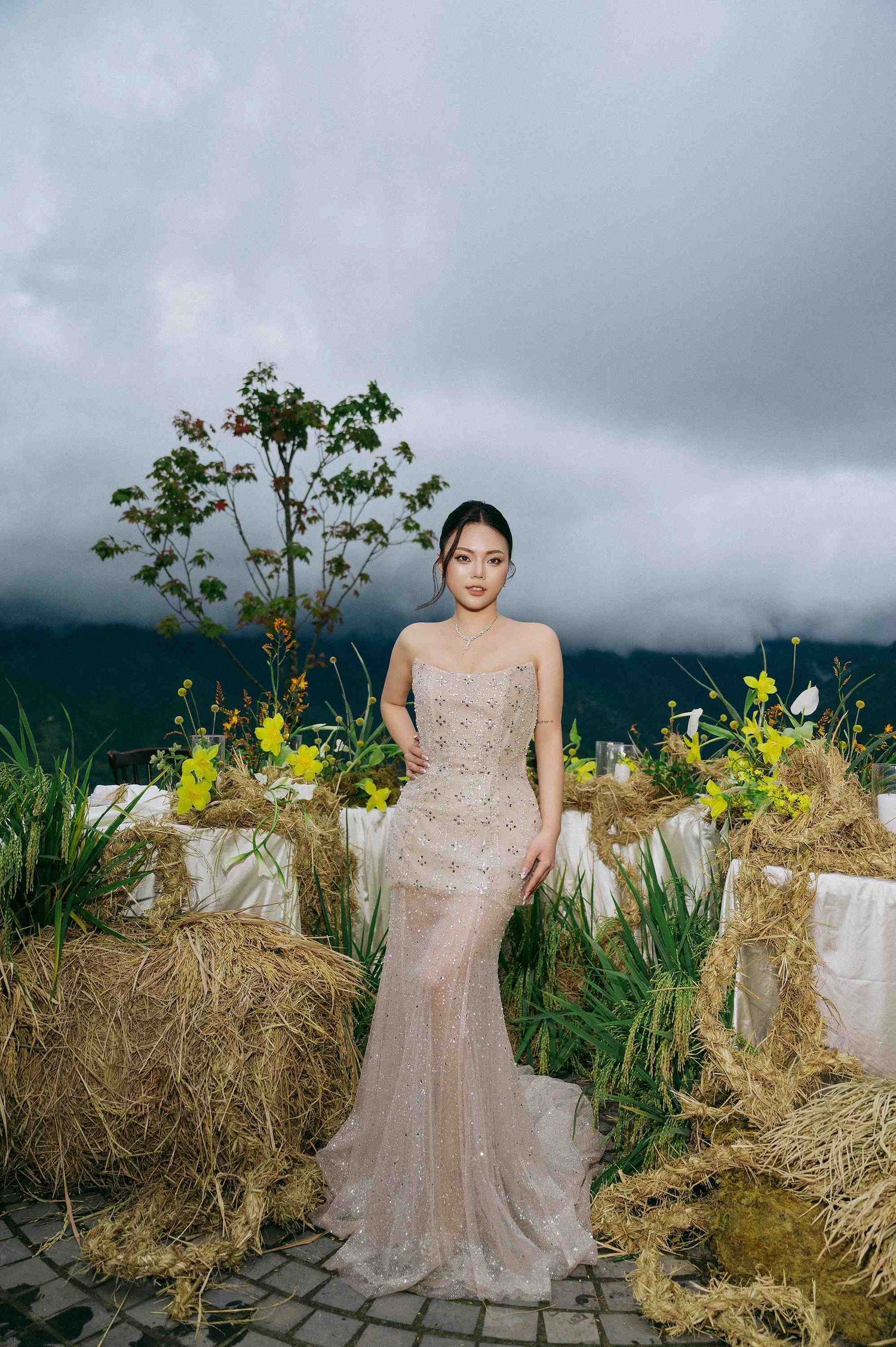 wedding: outdoor wedding setup with rustic hay decor and floral arrangements, by AnhVuWedding.