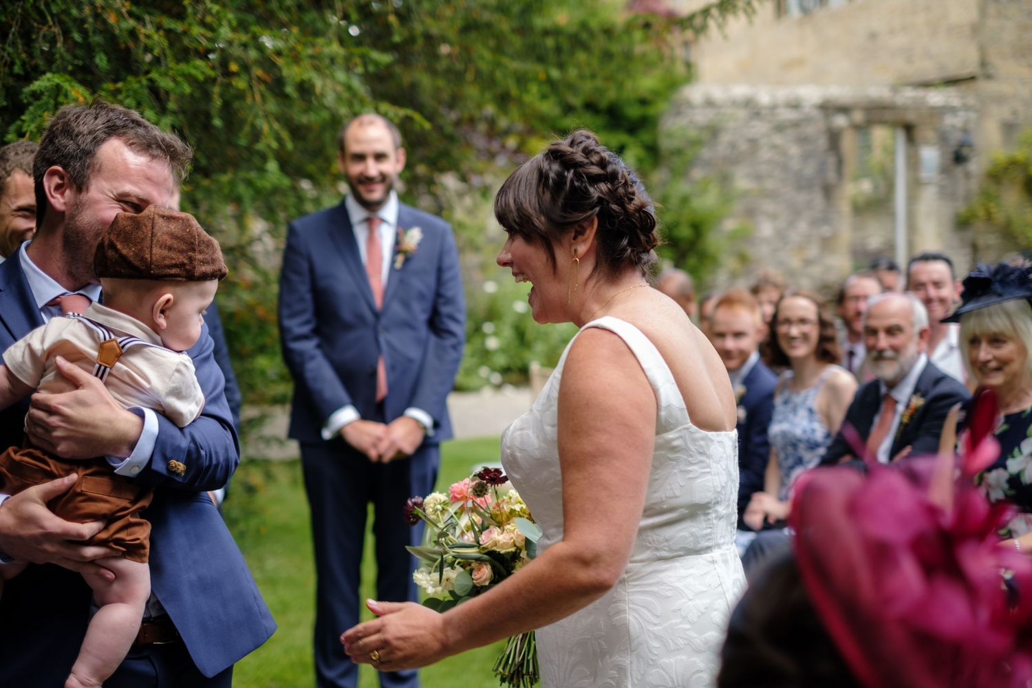 Outdoor wedding ceremony by Norfolk and Norwich wedding photographer covering Norfolk, Suffolk, Cambridgeshire, and throughout the UK.