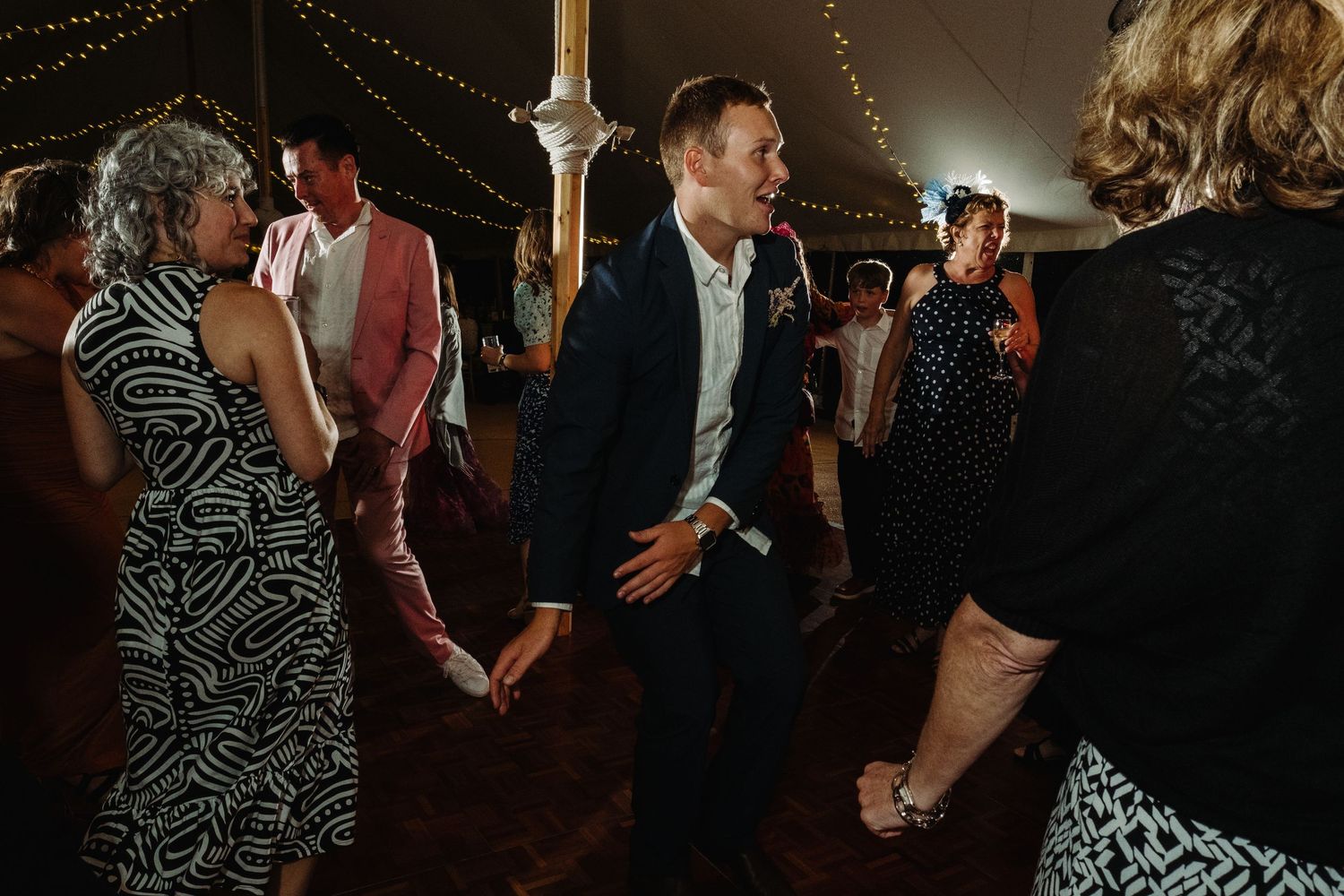 Wedding reception dancing by Norfolk wedding photographer covering Norfolk, Norwich, Suffolk, Cambridgeshire and throughout the UK.