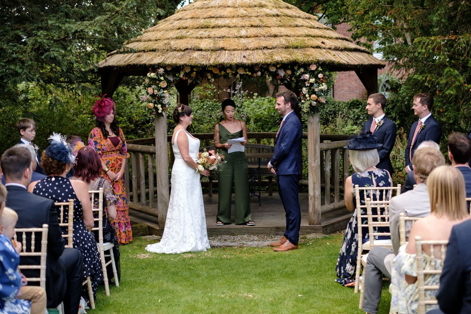 Outdoor wedding ceremony by Norfolk and Norwich wedding photographer covering Norfolk, Suffolk, Cambridgeshire, and throughout the UK.