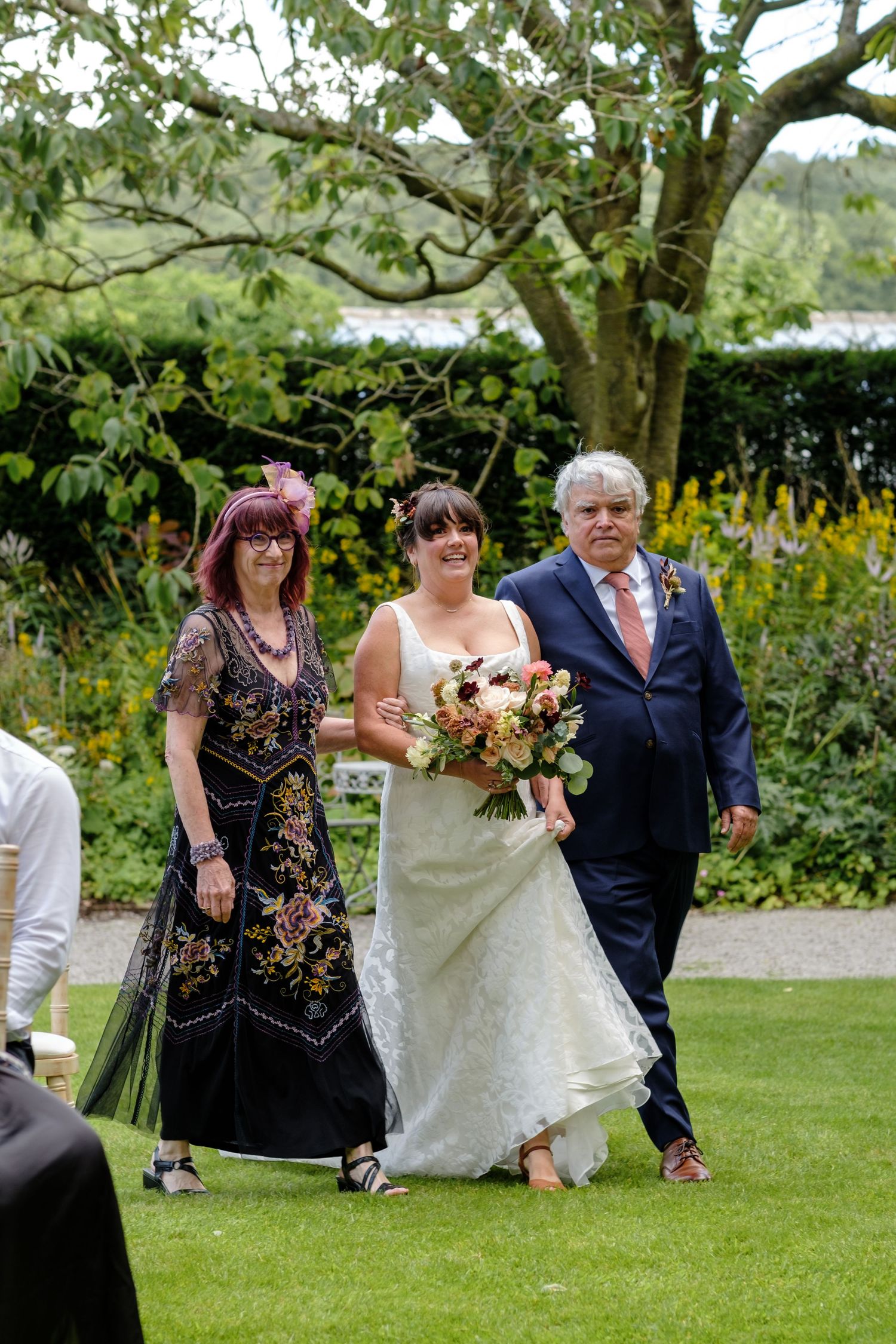Outdoor wedding ceremony by Norfolk and Norwich wedding photographer covering Norfolk, Suffolk, Cambridgeshire, and throughout the UK.
