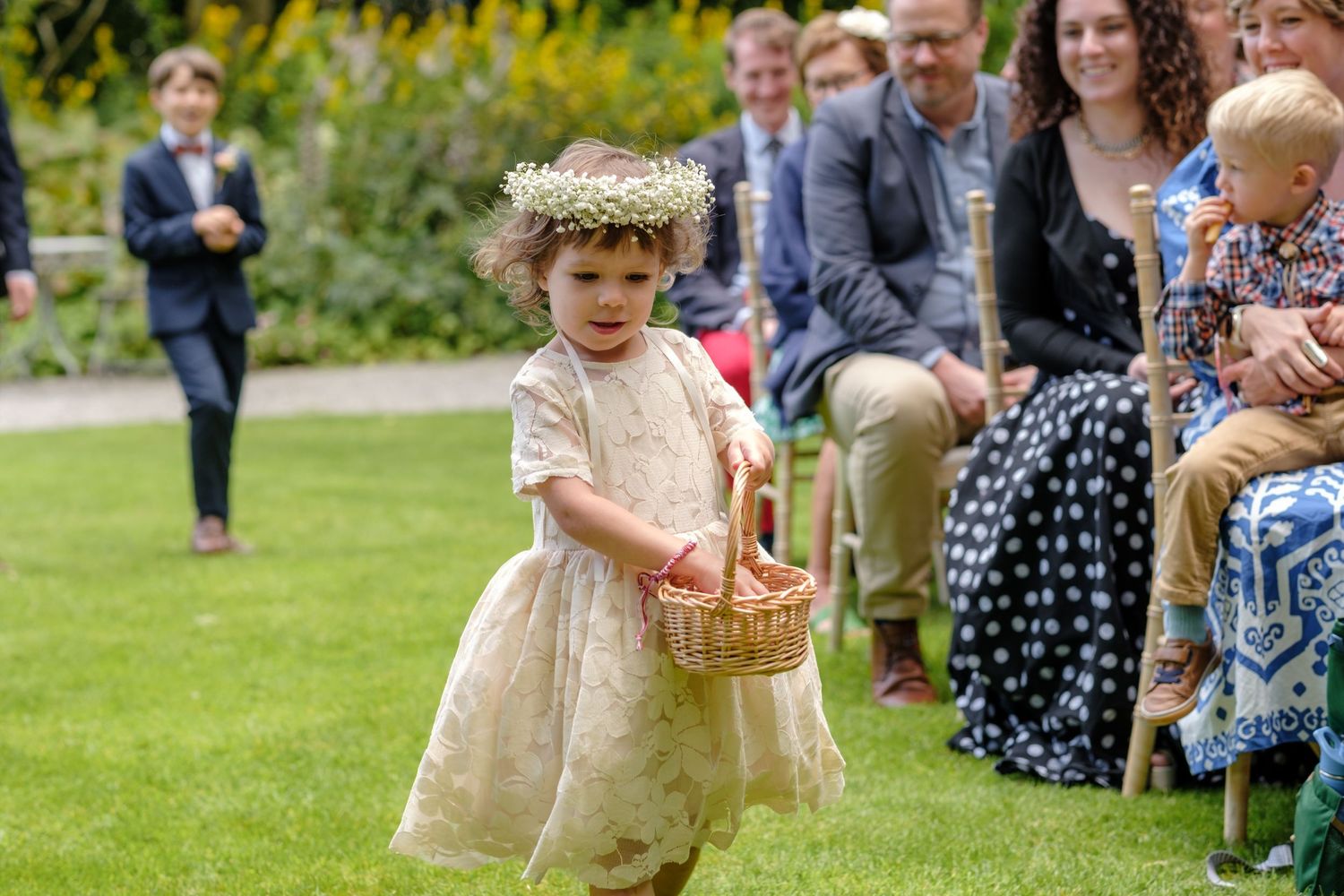 Outdoor wedding ceremony by Norfolk and Norwich wedding photographer covering Norfolk, Suffolk, Cambridgeshire, and throughout the UK.