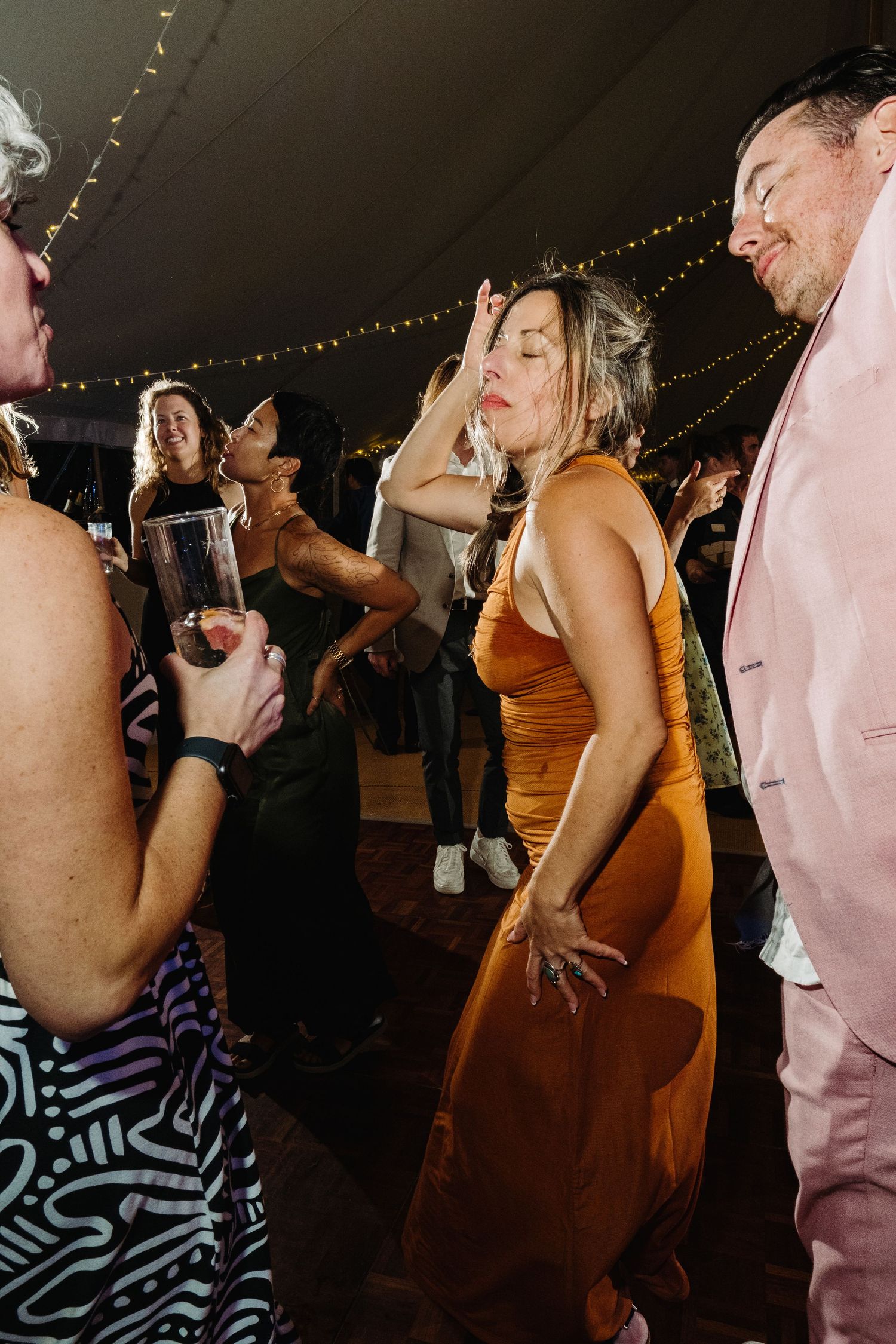 Wedding reception dancing by Norfolk wedding photographer covering Norfolk, Norwich, Suffolk, Cambridgeshire and throughout the UK.