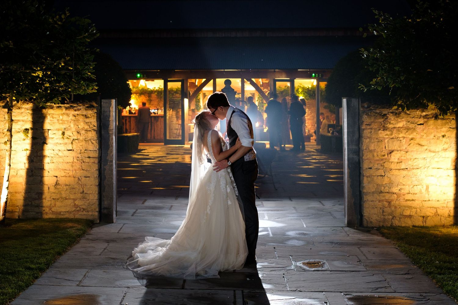 Fine art wedding portrait of a bride and groom outside a Norfolk wedding barn.