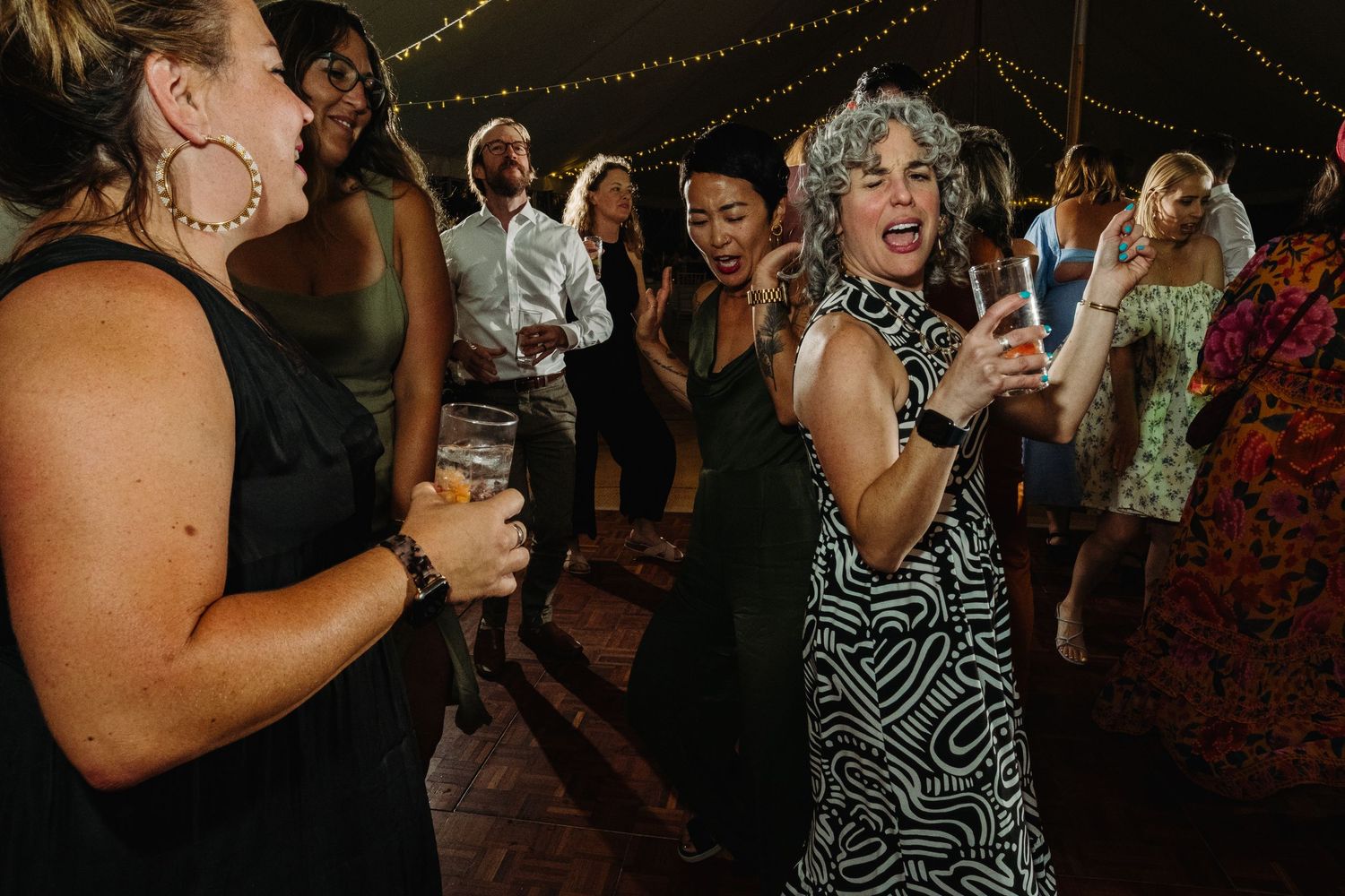 Wedding reception dancing by Norfolk wedding photographer covering Norfolk, Norwich, Suffolk, Cambridgeshire and throughout the UK.