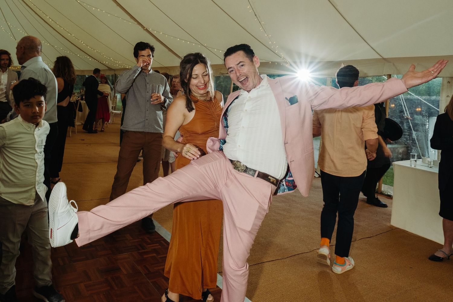 Wedding reception dancing by Norfolk wedding photographer covering Norfolk, Norwich, Suffolk, Cambridgeshire and throughout the UK.