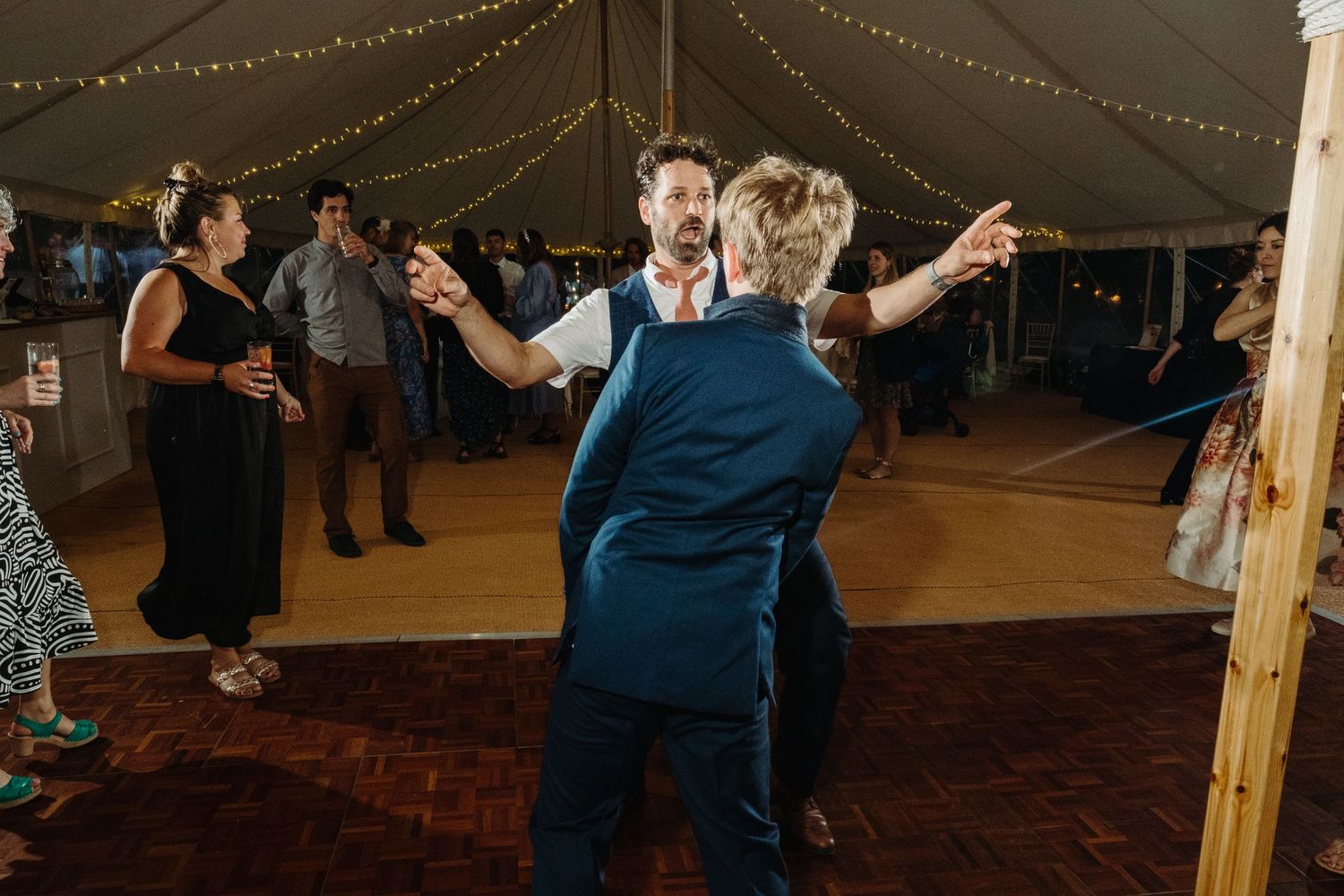 Wedding reception dancing by Norfolk wedding photographer covering Norfolk, Norwich, Suffolk, Cambridgeshire and throughout the UK.
