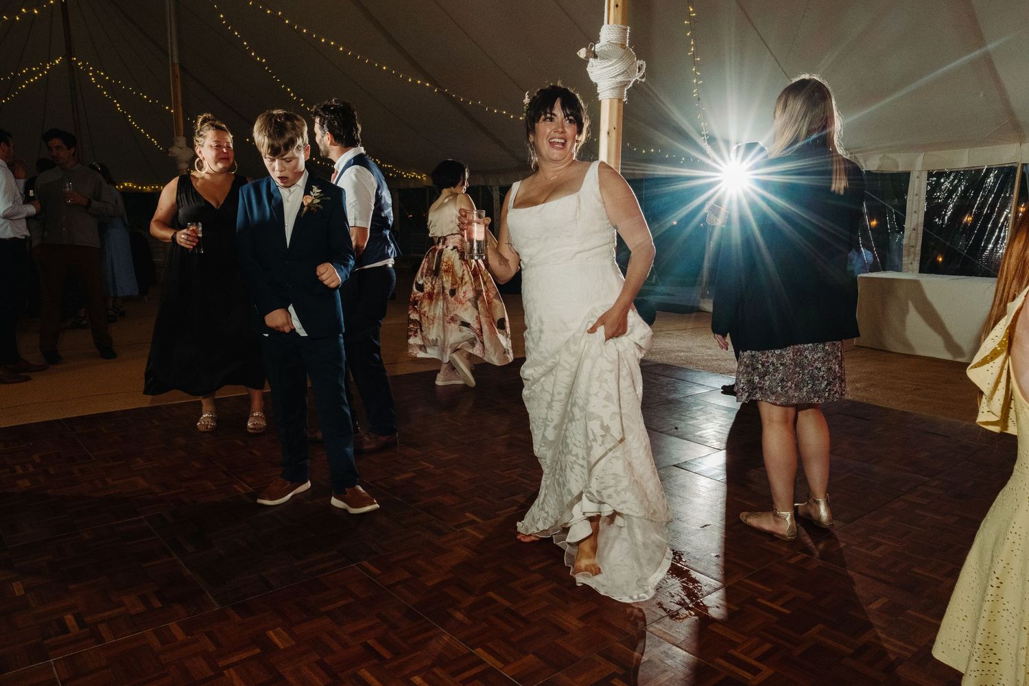Wedding reception dancing by Norfolk wedding photographer covering Norfolk, Norwich, Suffolk, Cambridgeshire and throughout the UK.