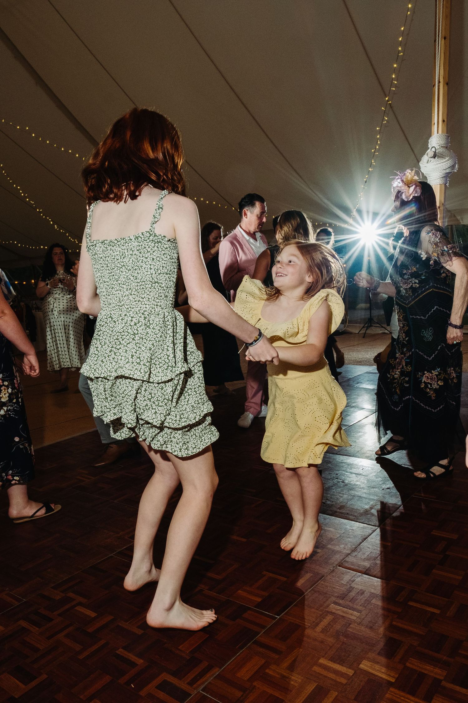 Wedding reception dancing by Norfolk wedding photographer covering Norfolk, Norwich, Suffolk, Cambridgeshire and throughout the UK.