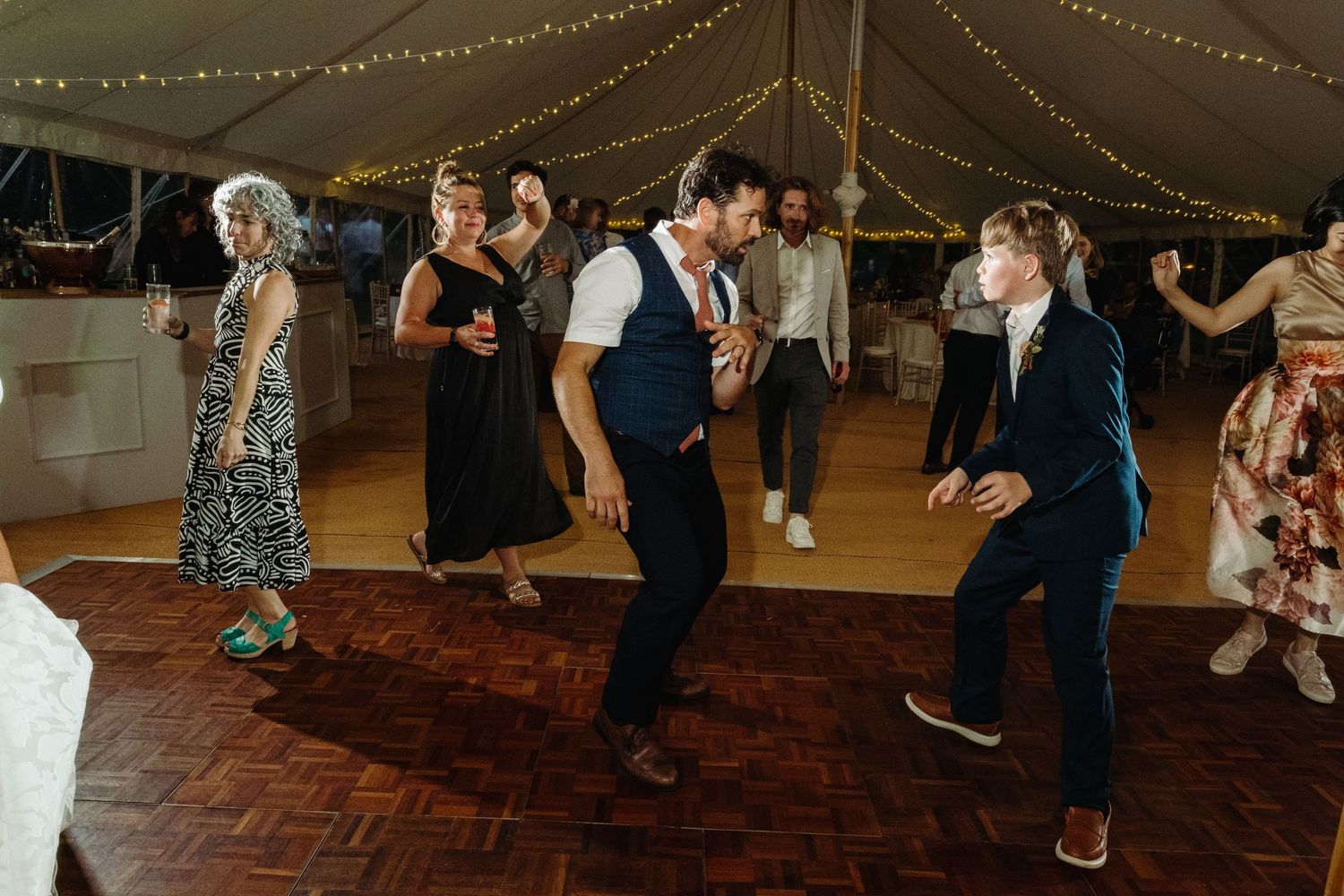 Wedding reception dancing by Norfolk wedding photographer covering Norfolk, Norwich, Suffolk, Cambridgeshire and throughout the UK.