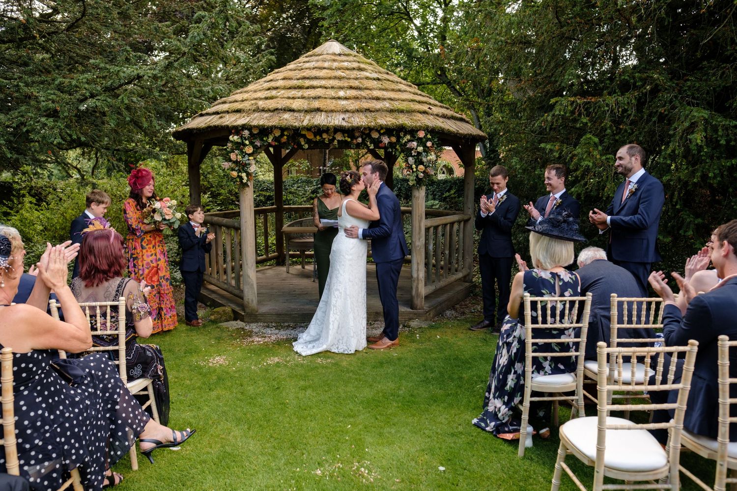 Outdoor wedding ceremony by Norfolk and Norwich wedding photographer covering Norfolk, Suffolk, Cambridgeshire, and throughout the UK.