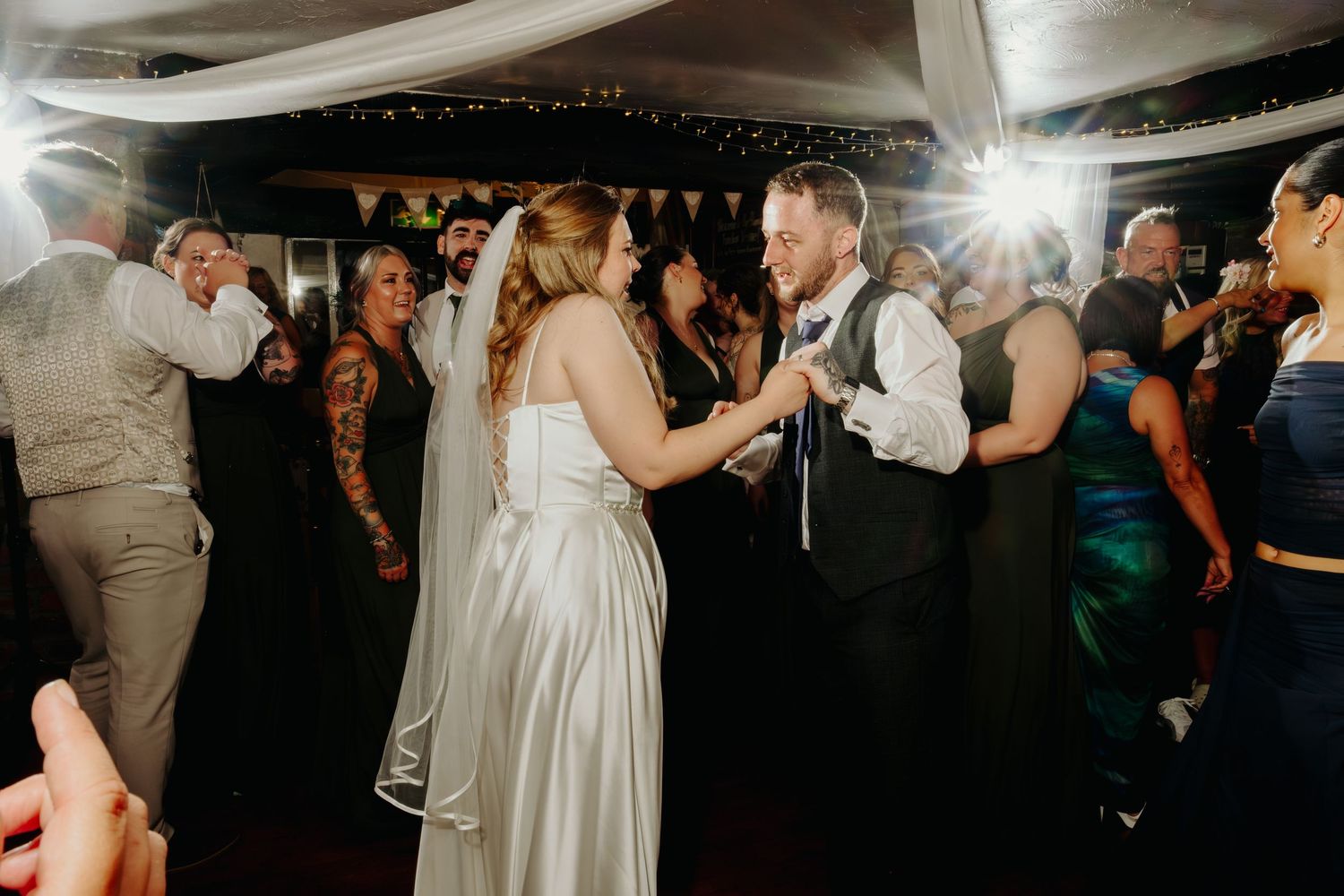 A beautiful sunset wedding by Norfolk and Norwich wedding photographer. Top 100 wedding photographer covering Norfolk, Suffolk, Cambridge.