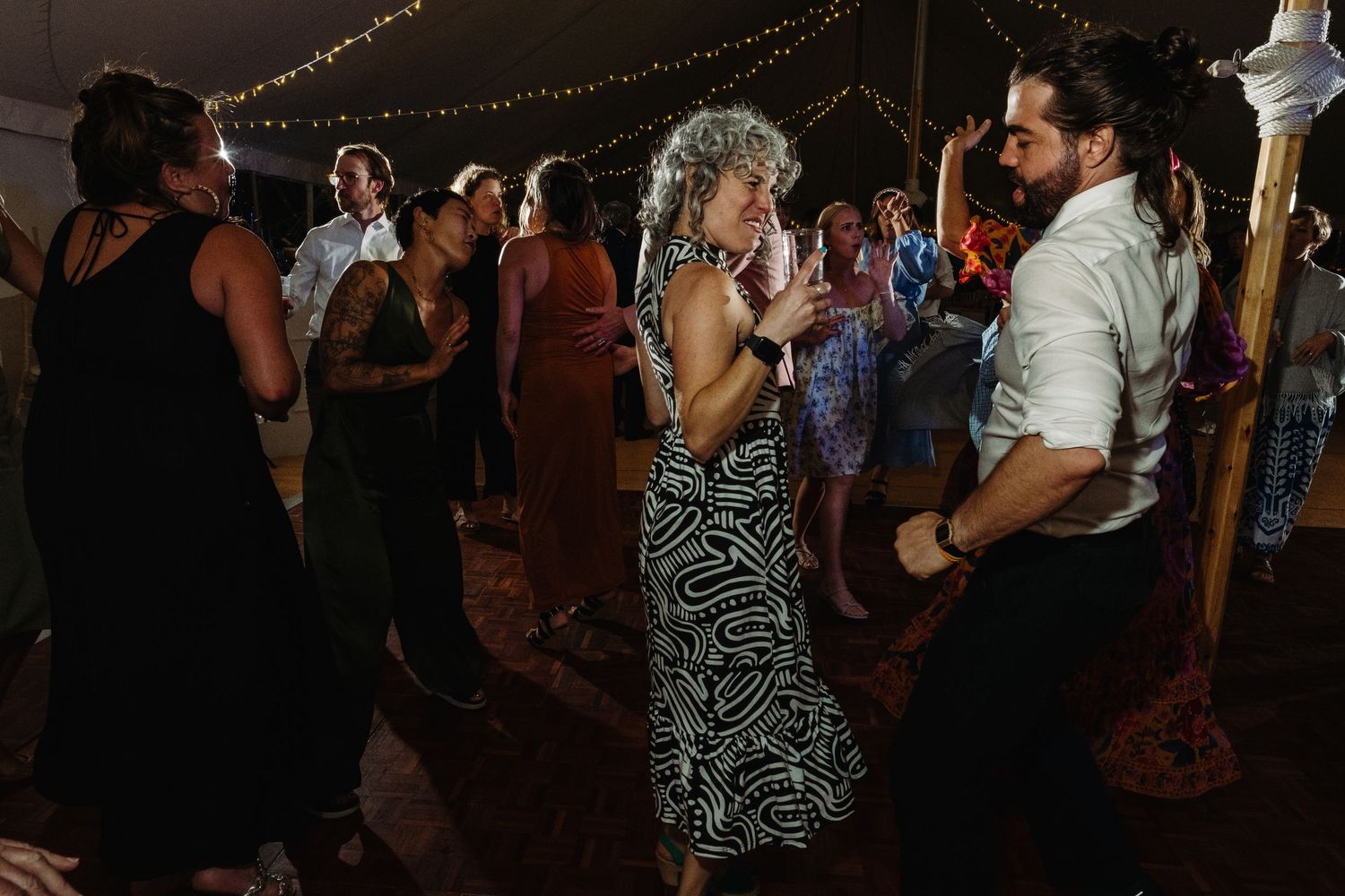 Wedding reception dancing by Norfolk wedding photographer covering Norfolk, Norwich, Suffolk, Cambridgeshire and throughout the UK.