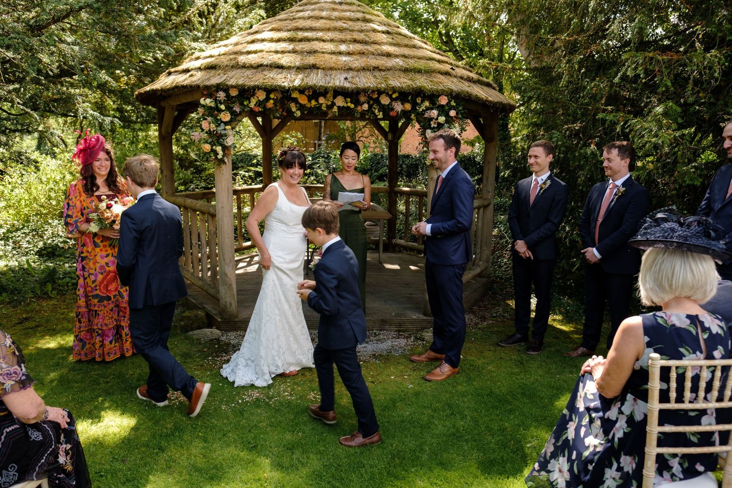Outdoor wedding ceremony by Norfolk and Norwich wedding photographer covering Norfolk, Suffolk, Cambridgeshire, and throughout the UK.