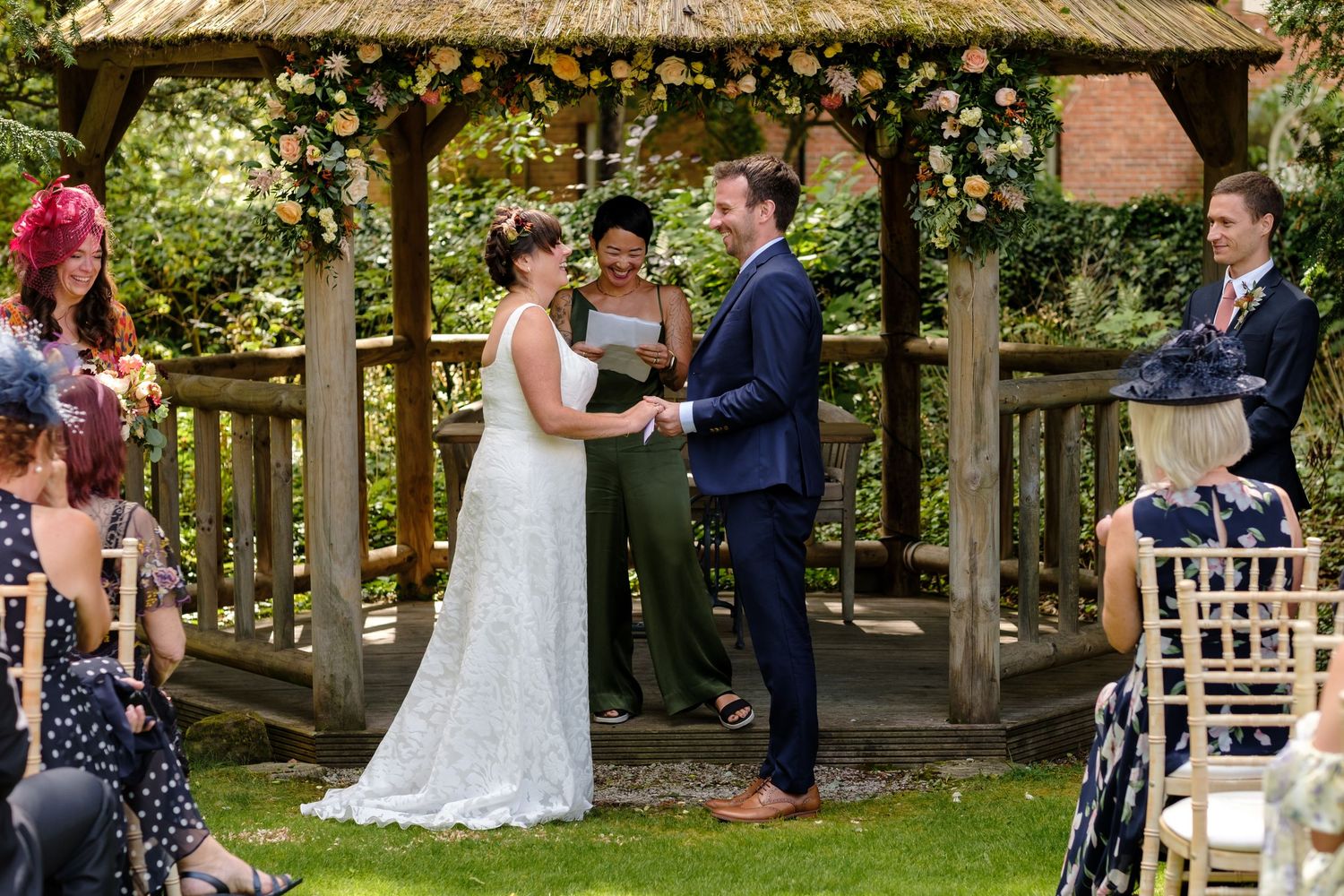 Outdoor wedding ceremony by Norfolk and Norwich wedding photographer covering Norfolk, Suffolk, Cambridgeshire, and throughout the UK.