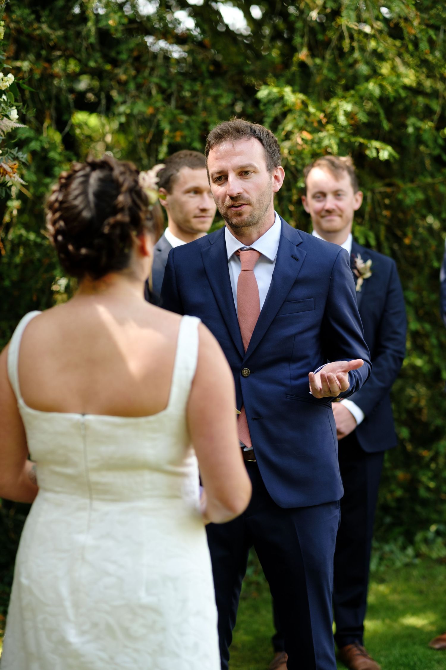 Outdoor wedding ceremony by Norfolk and Norwich wedding photographer covering Norfolk, Suffolk, Cambridgeshire, and throughout the UK.