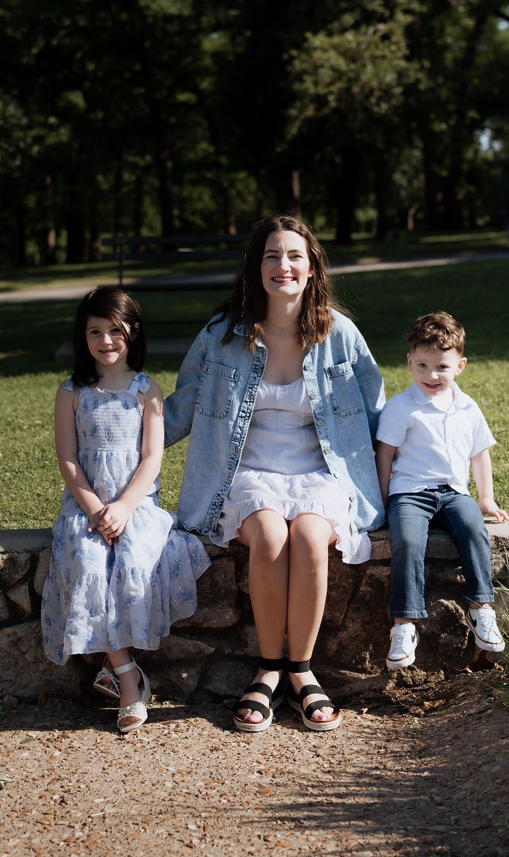 Mother and children cheesing for a picture