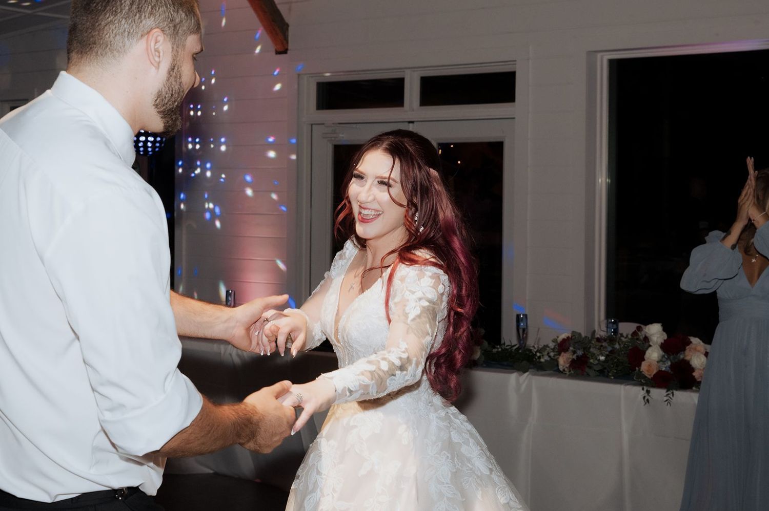 Bride and groom vibing on the dance floor