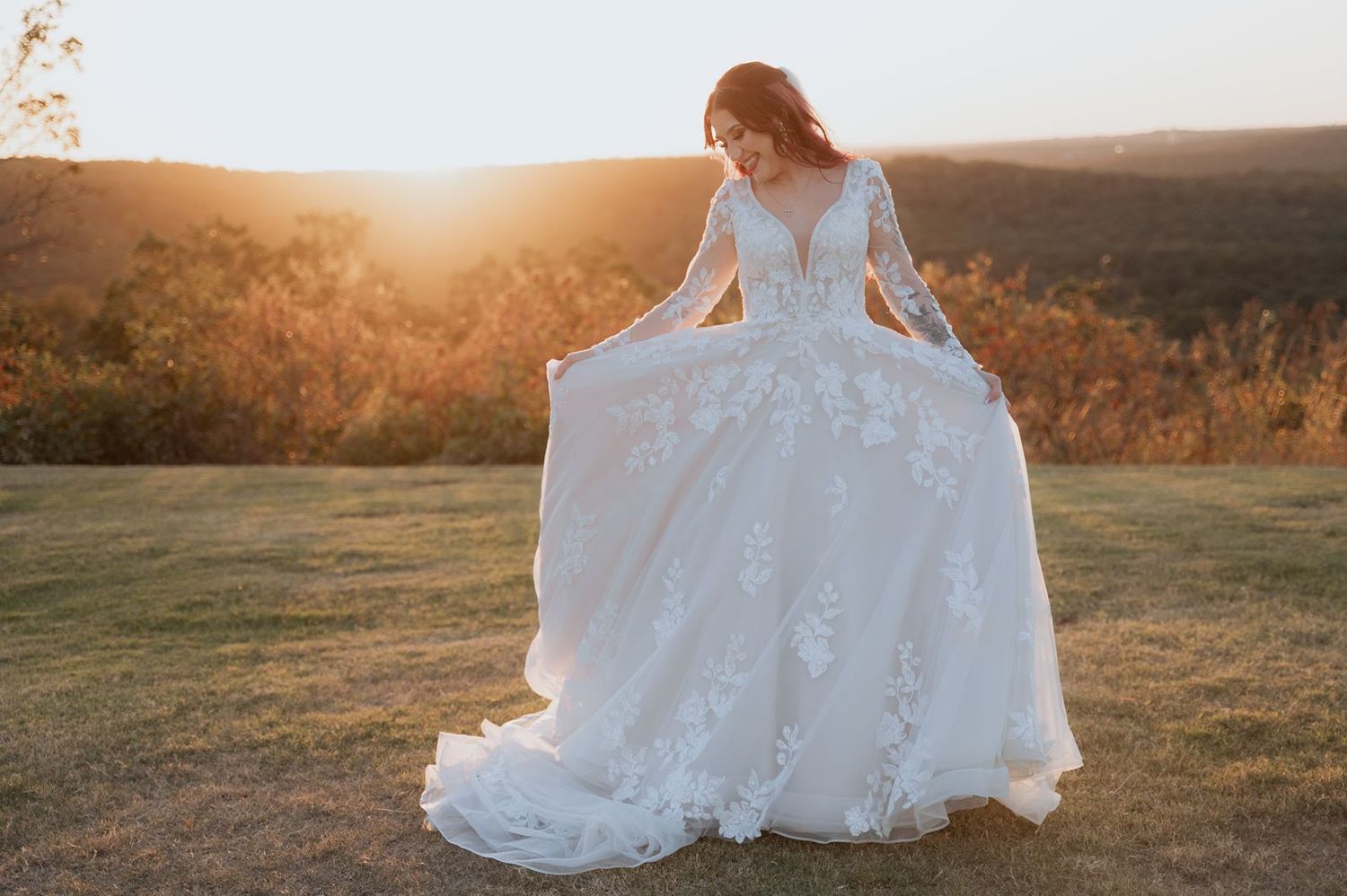 Bride and beautiful sunset at Oklahoma wedding venue