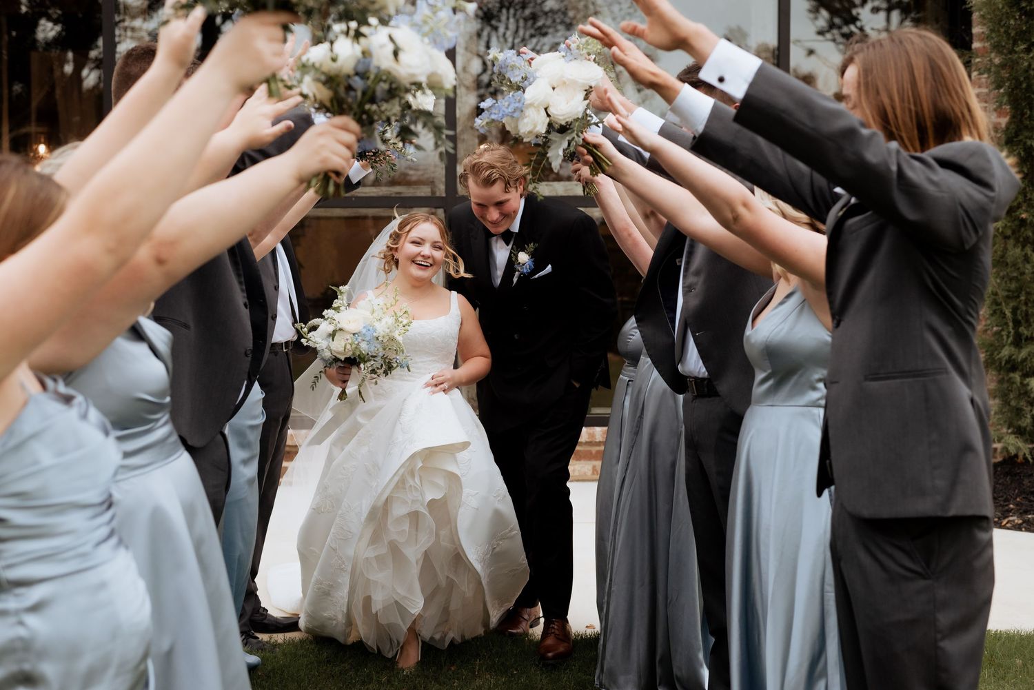 Tulsa Wedding with bride and groom and wedding party celebrating