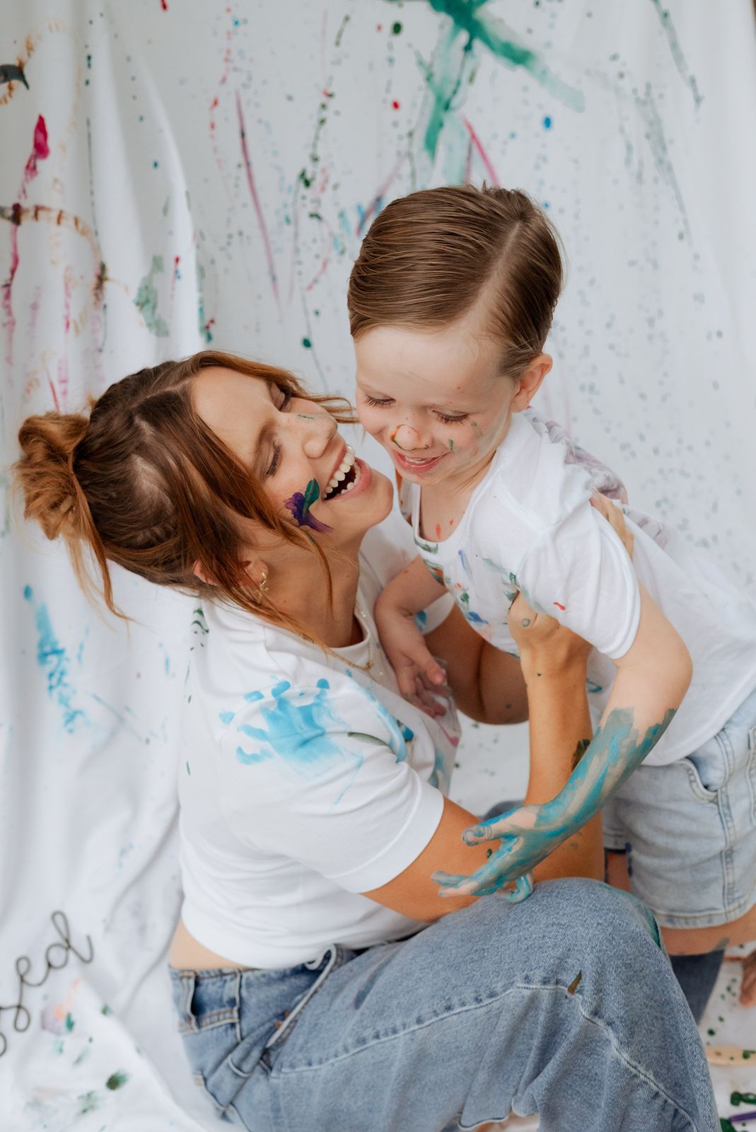 Mother and son in a painting mini photography session and making memories