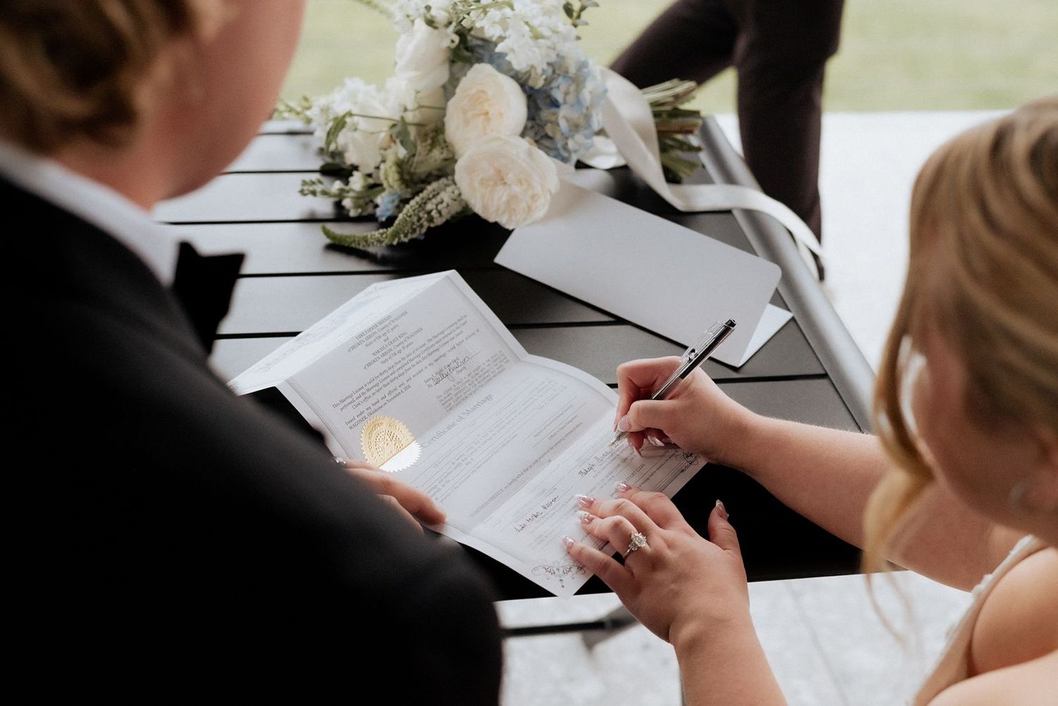 1684 Venue bride and groom signing license