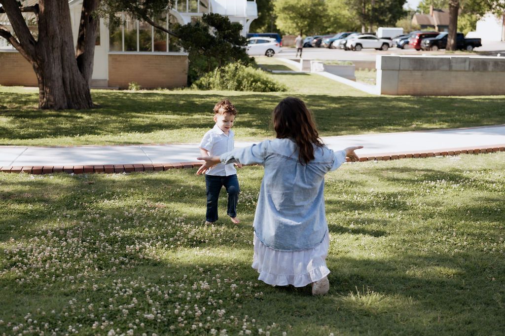 Mom getting an embrace from her son at Tulsa Park