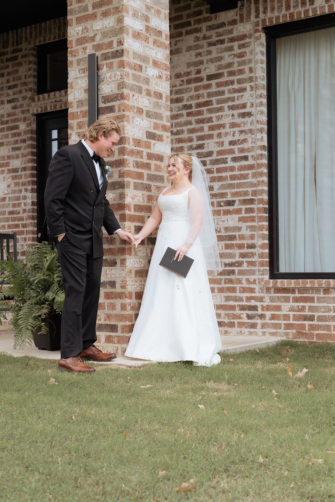 Bride and groom first look at 1684 venue