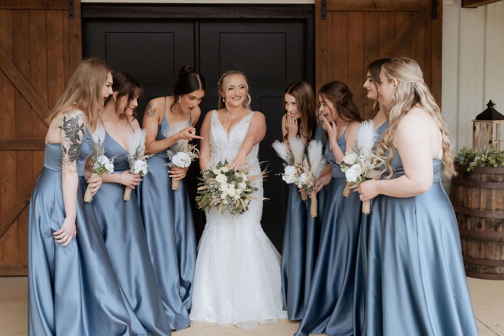 Oklahoma bridesmaids adoring the Bride's wedding ring