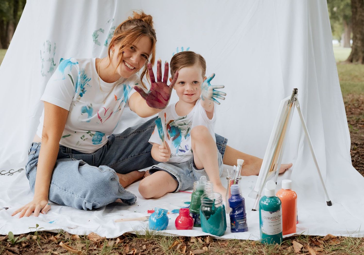 mother and son covered in paint in a photography session