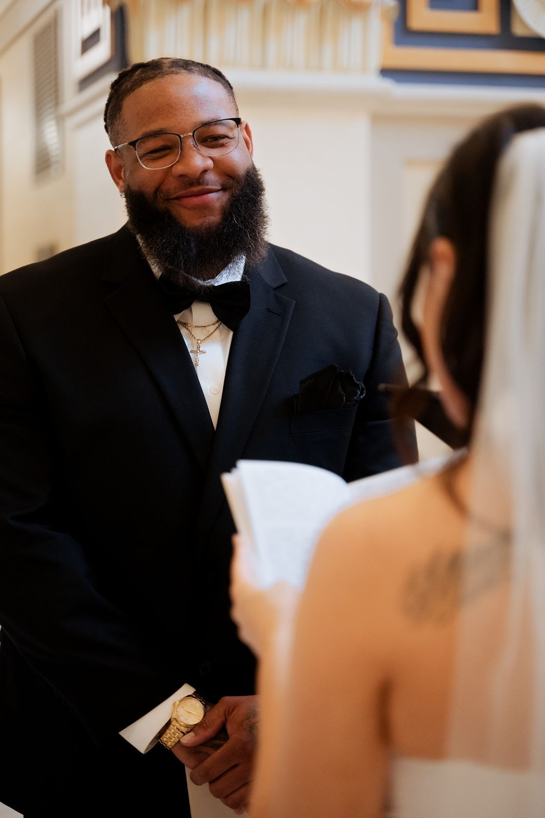 Groom smiling at bride Oklahoma Wedding Venue