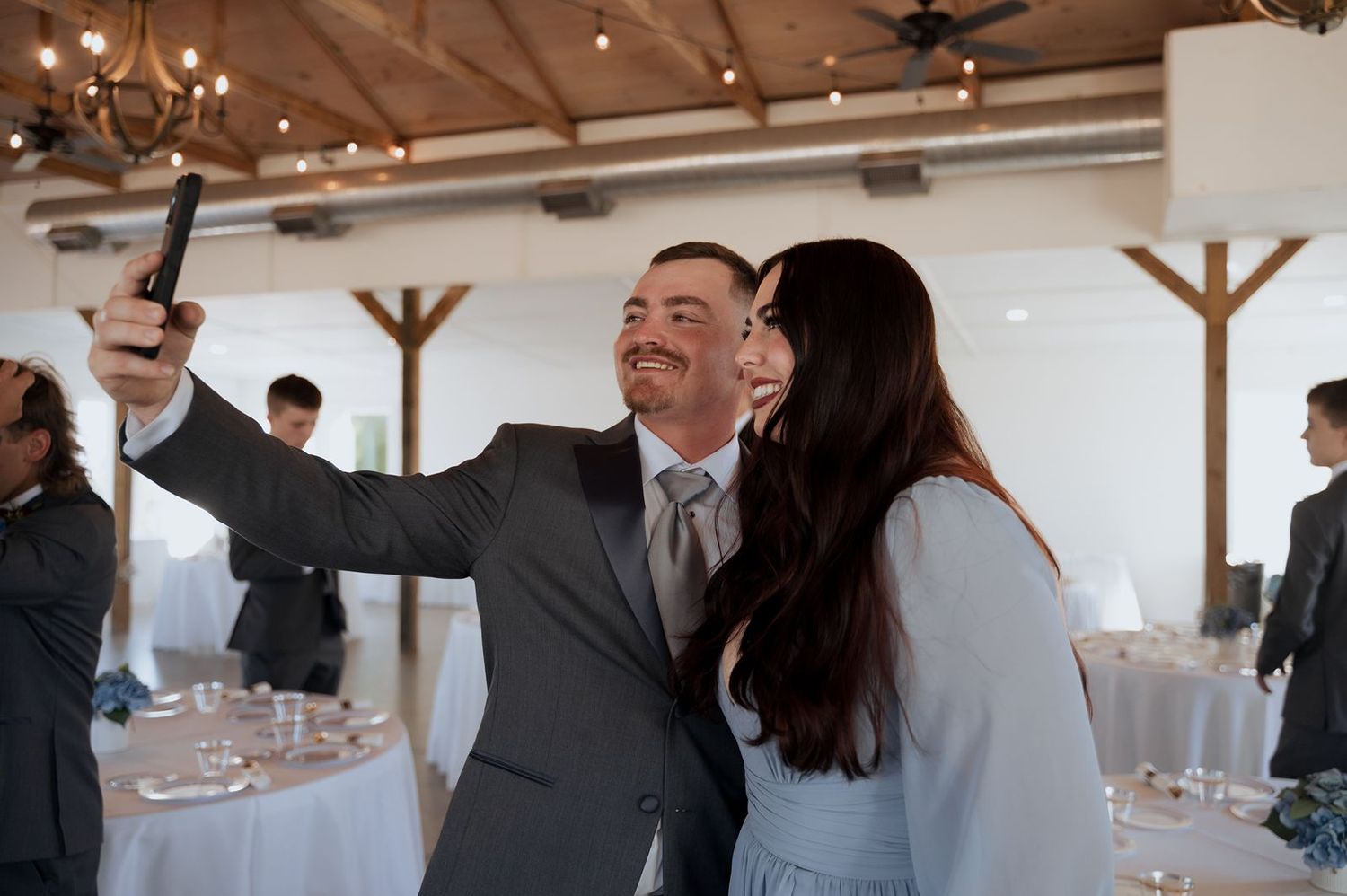 couple taking a selfie inside Oklahoma wedding venue