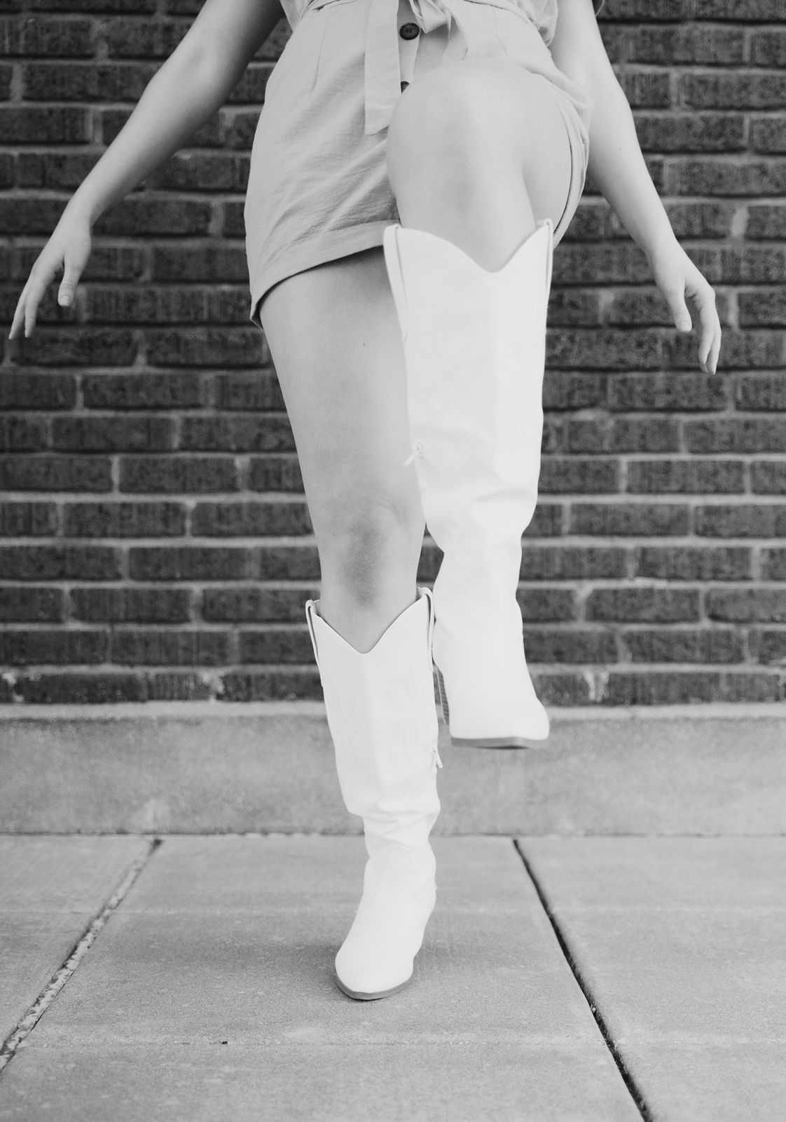Detail photo of girl's white boots