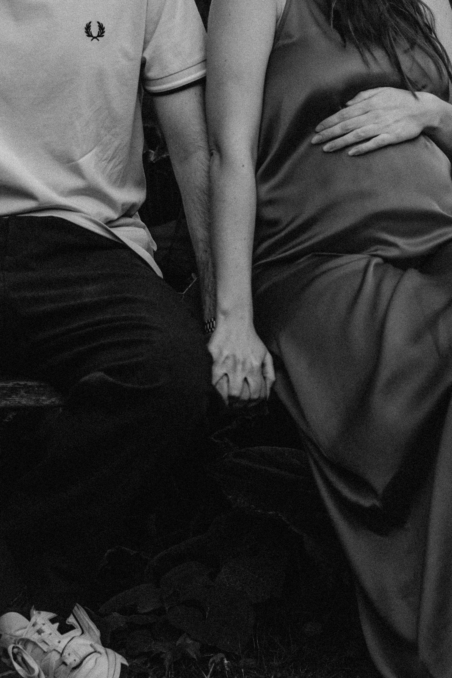 Intimate black and white maternity photo details showing gentle moments.