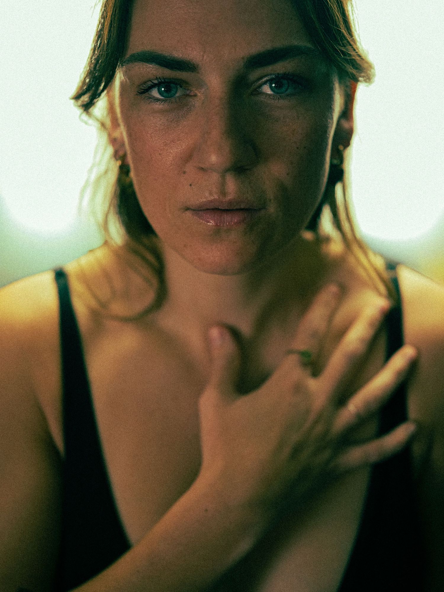 Artistic portrait sequence with warm tones and changing expressions.