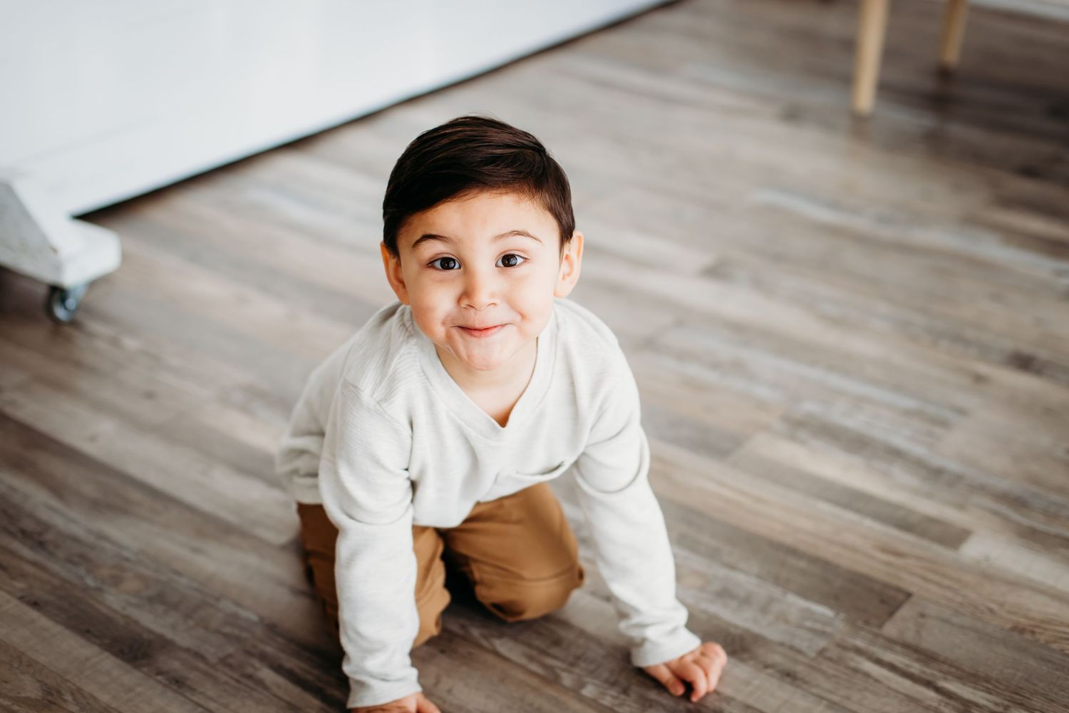 little boy looking at camera in studio