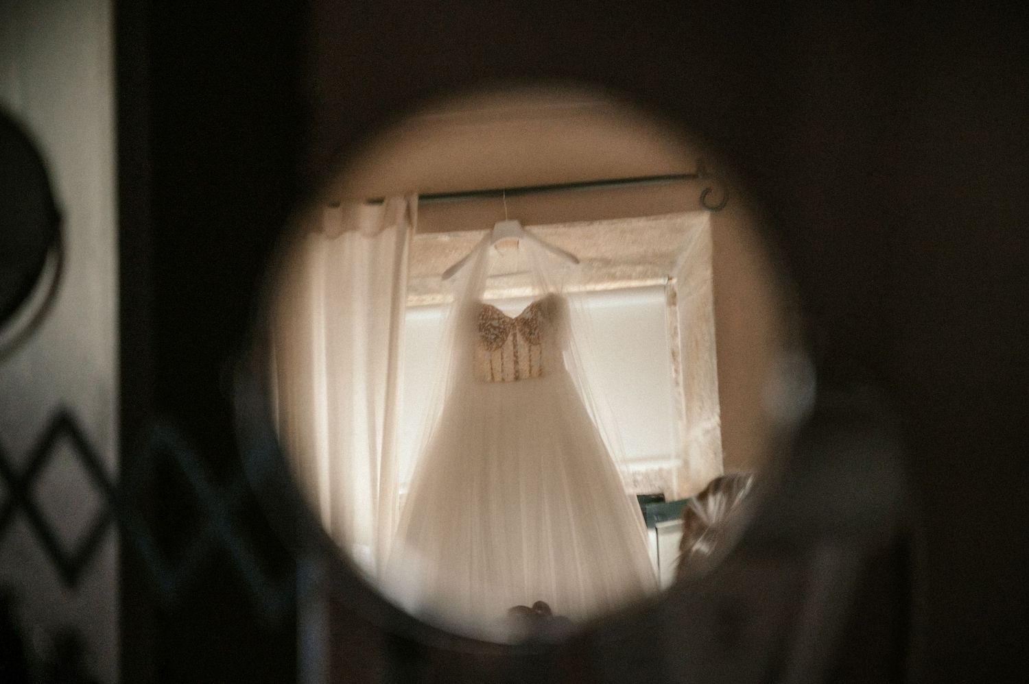 Artistic blurred bokeh photograph showing soft light through windows creating a moody atmosphere.