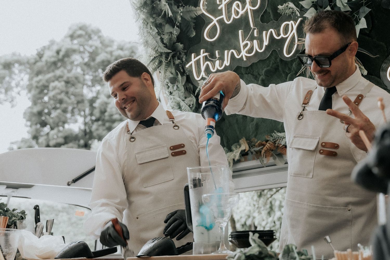 A sequence of candid reception moments showing guests enjoying drinks and conversation at an outdoor wedding venue.