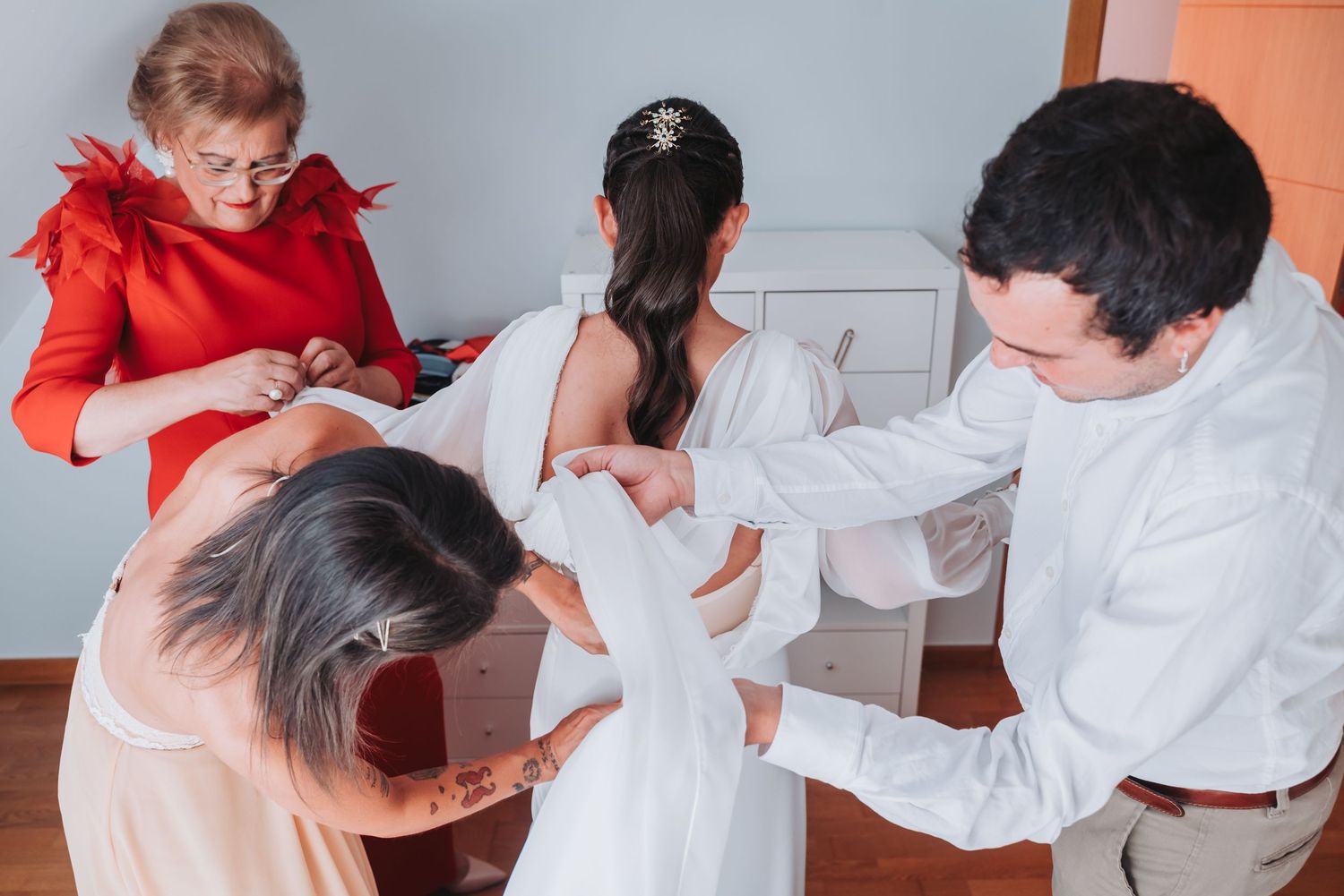 Healthcare professionals in white coats demonstrate proper hand washing technique in a medical setting.