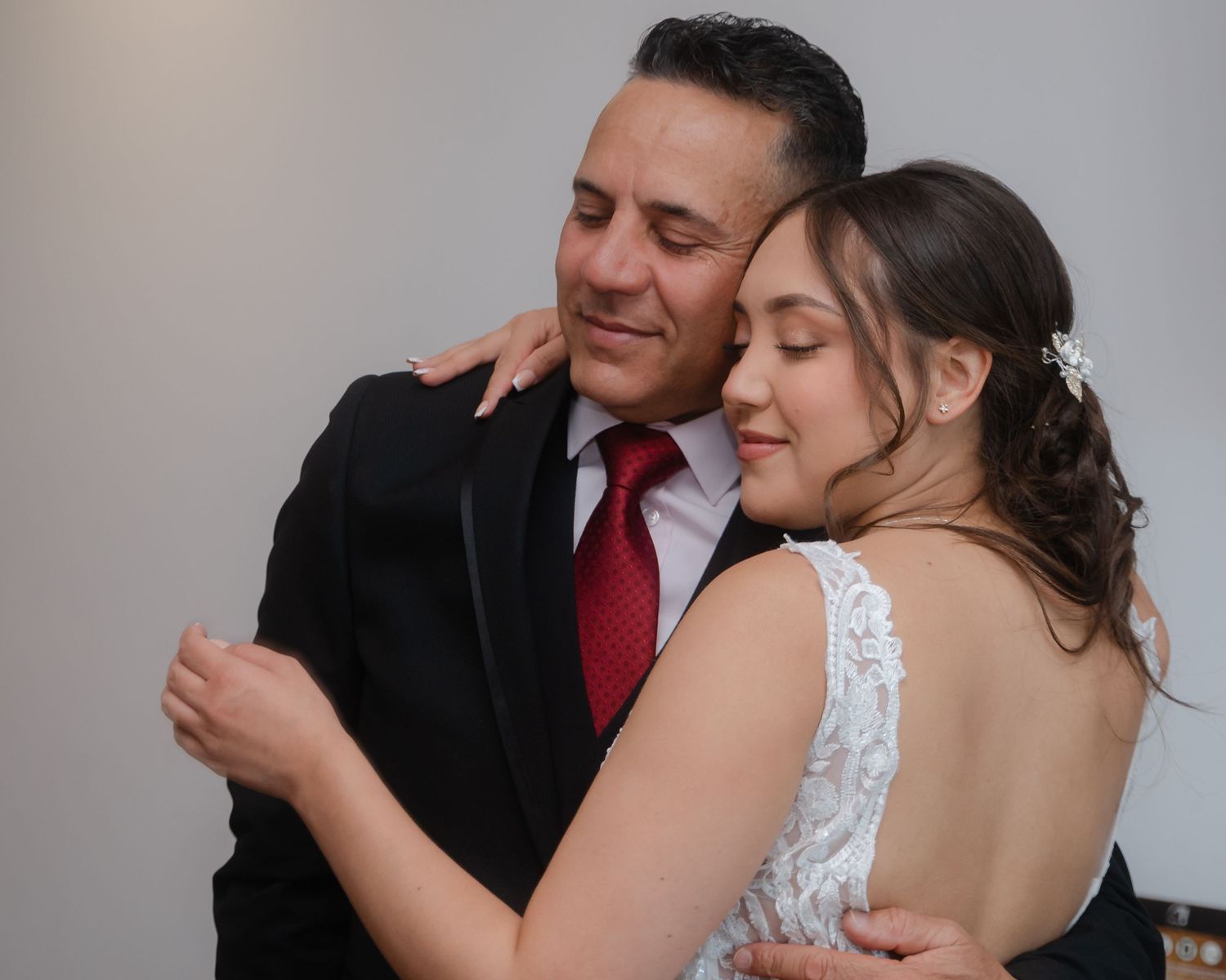 Wedding couple shares intimate moments in a sequence of romantic black and white photographs.