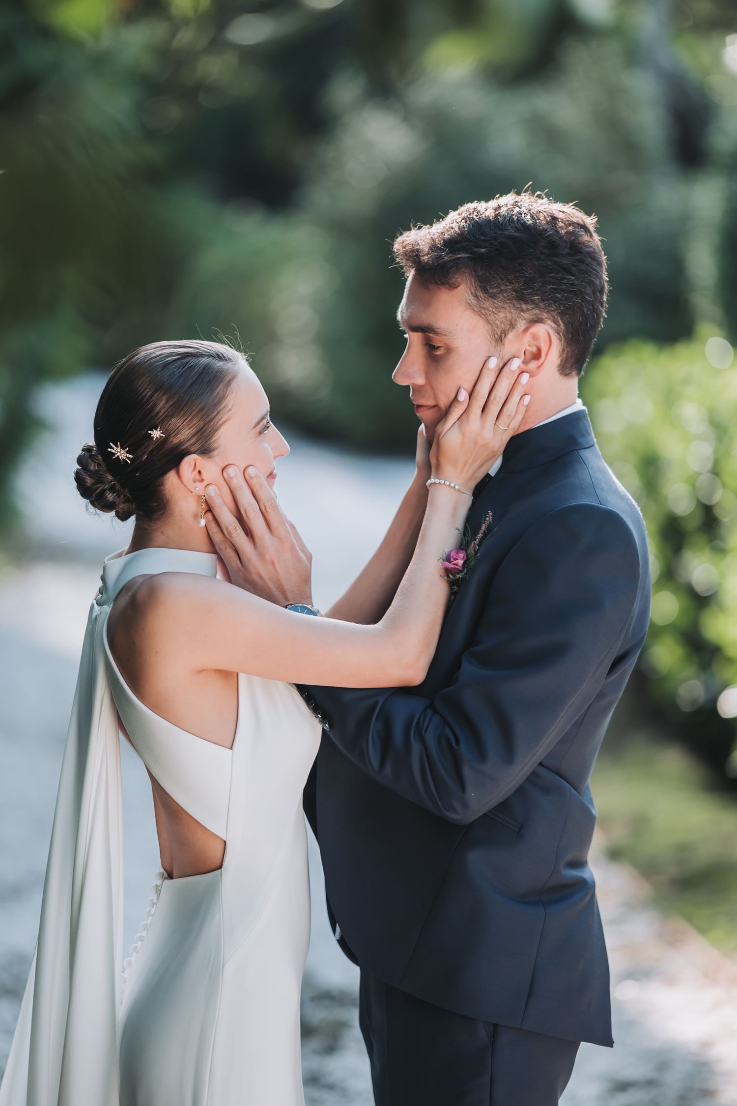 A romantic sequence of wedding photos showing a couple sharing their first kiss as newlyweds in an outdoor garden setting.