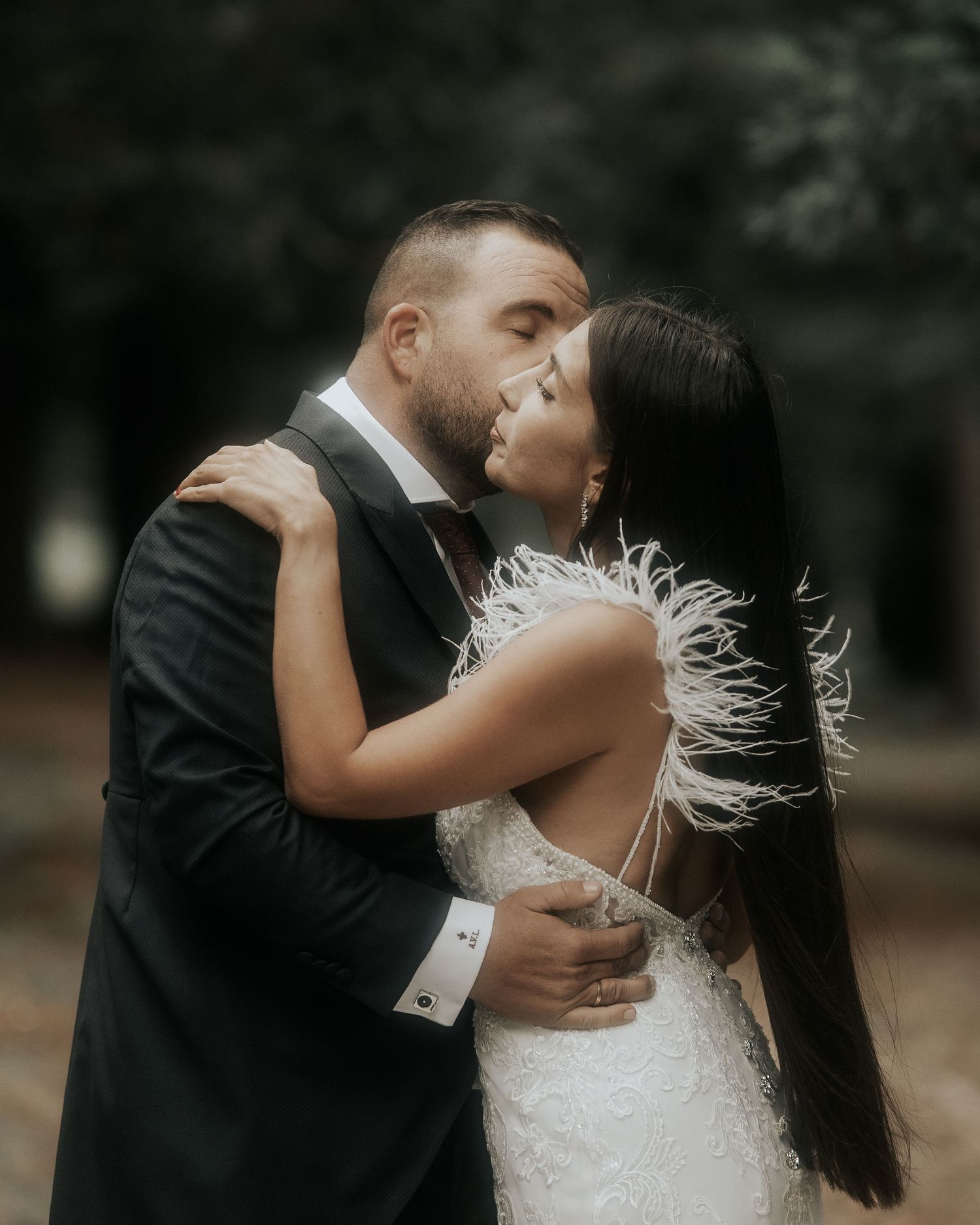 A romantic wedding couple shares intimate kisses in a series of artistic black and white photographs.