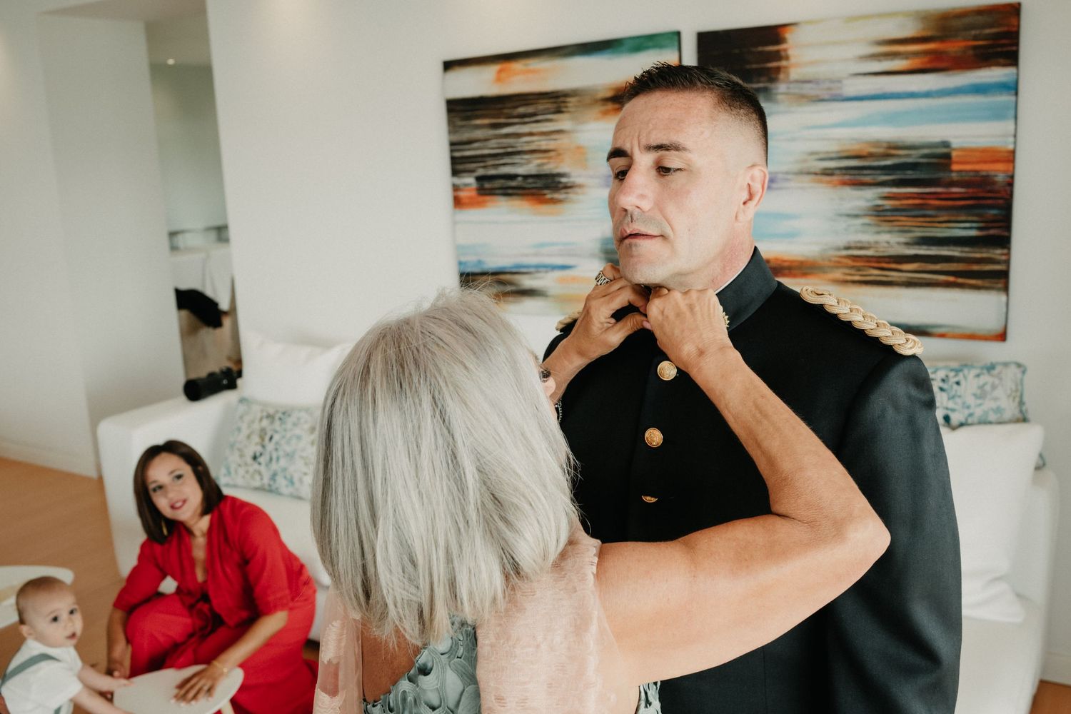 A series of candid moments captured during a professional photography session in a bright indoor setting.